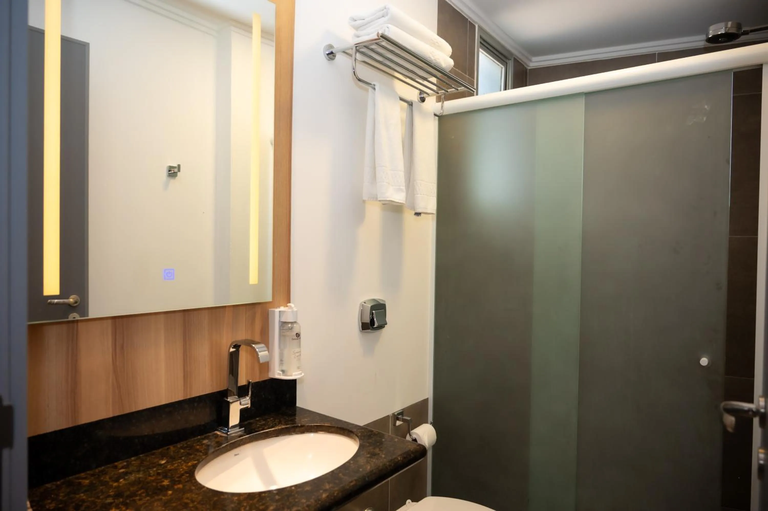 Bedroom in Delcas Hotel