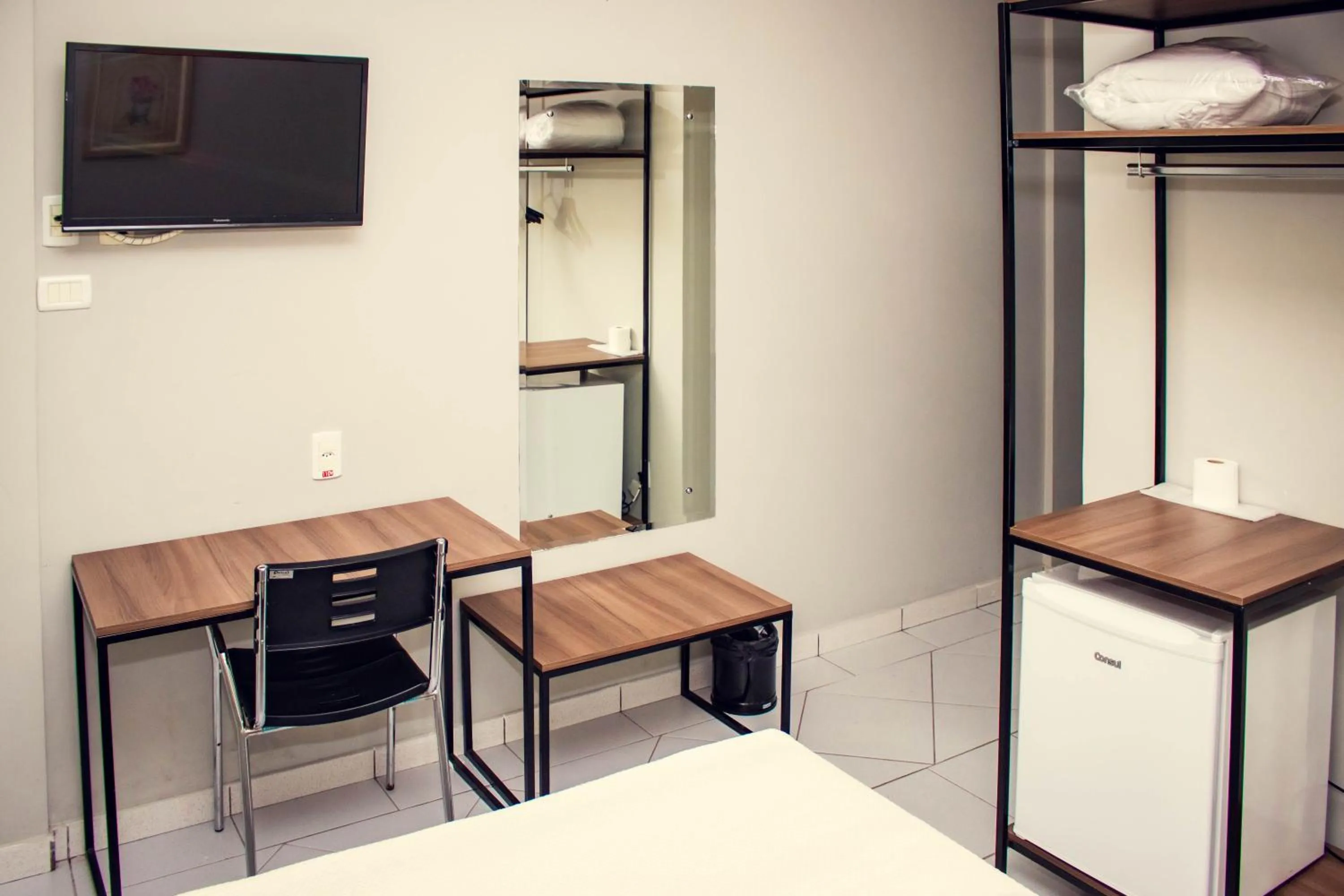 Bedroom in Delcas Hotel