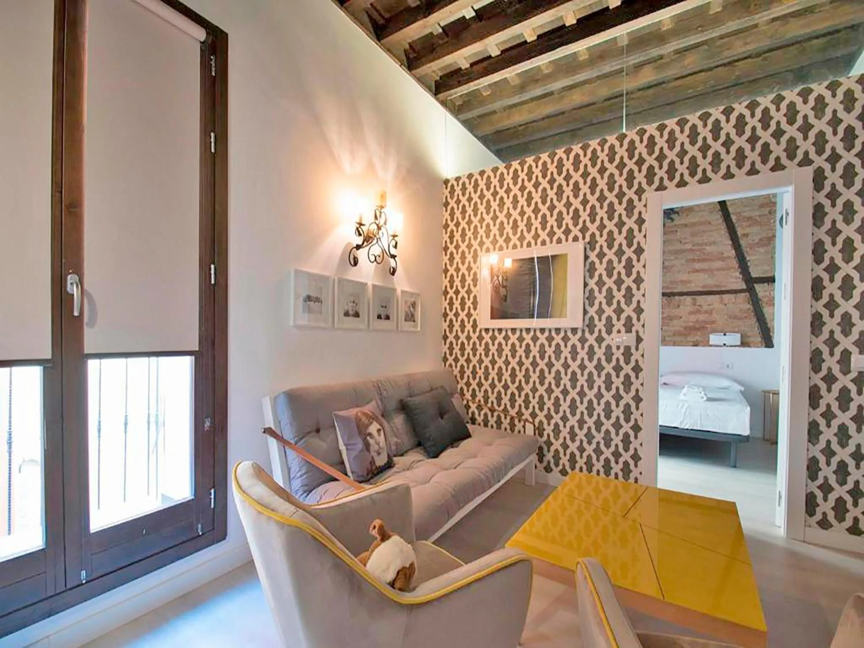 Living room, Bed in Apartamentos Real Suites Realejo 3000