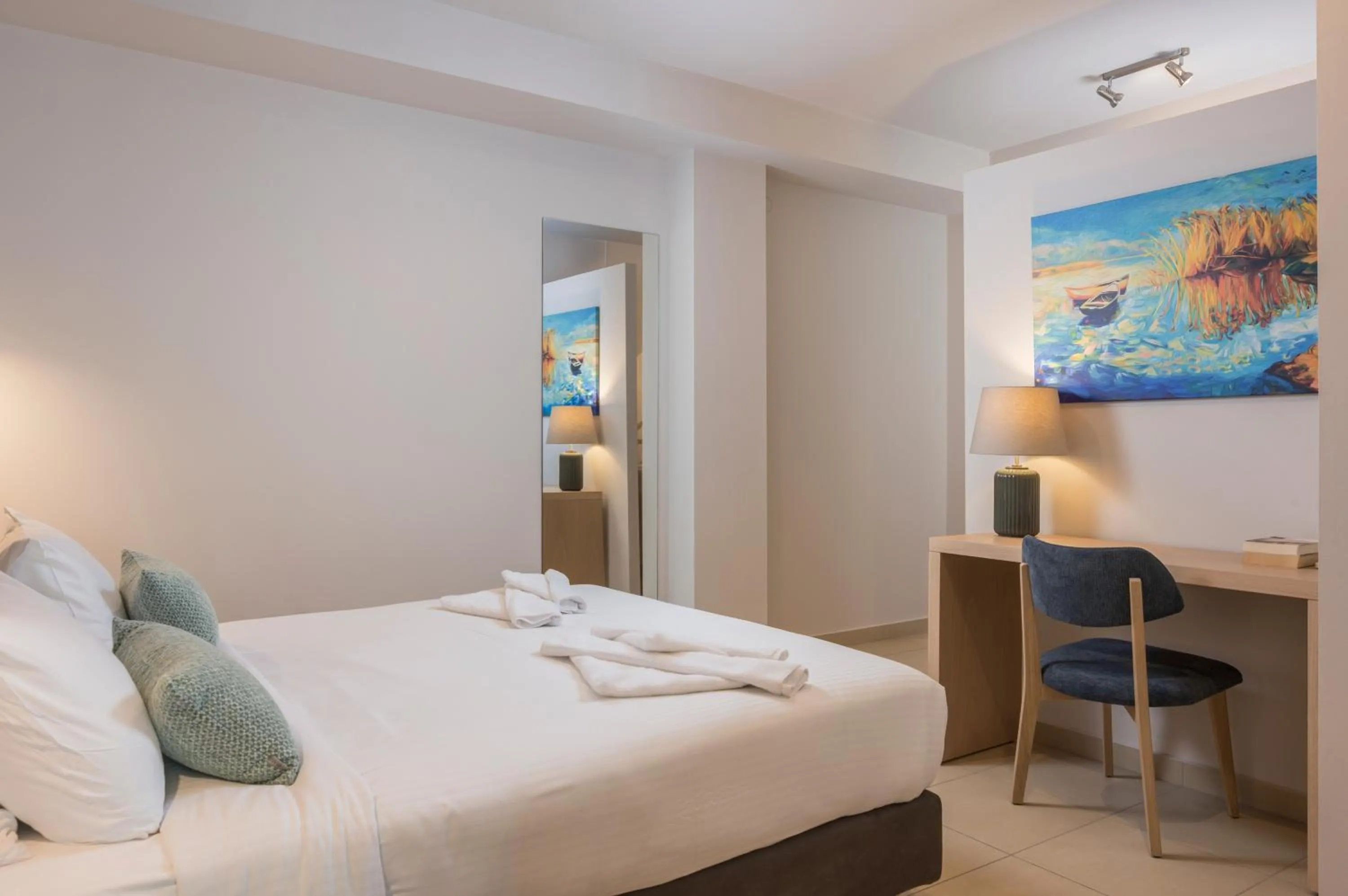 Bed in Trianon Luxury Apartments & Suites