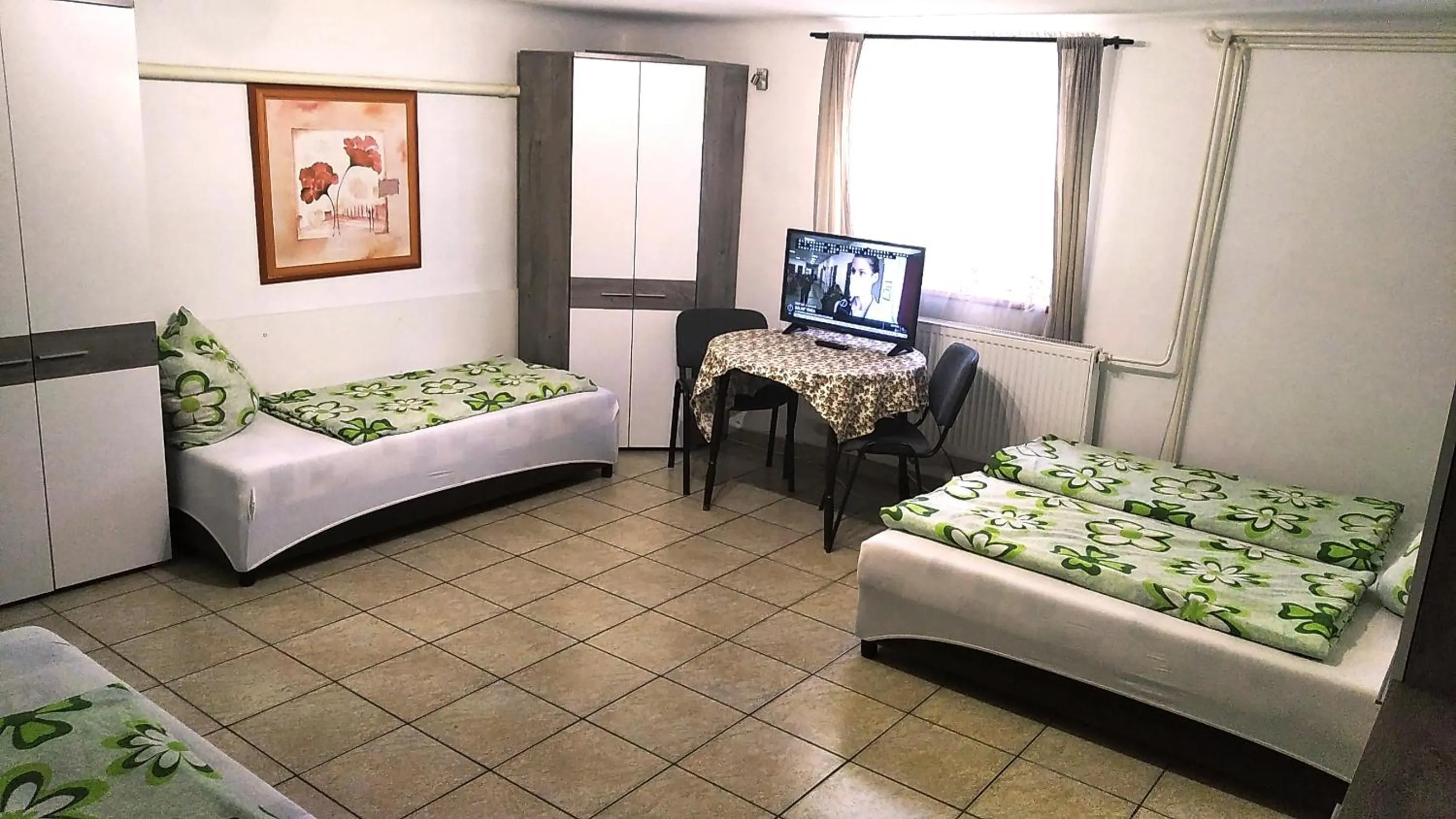 Quadruple Room with Shared Bathroom - single occupancy in Hostel Maros