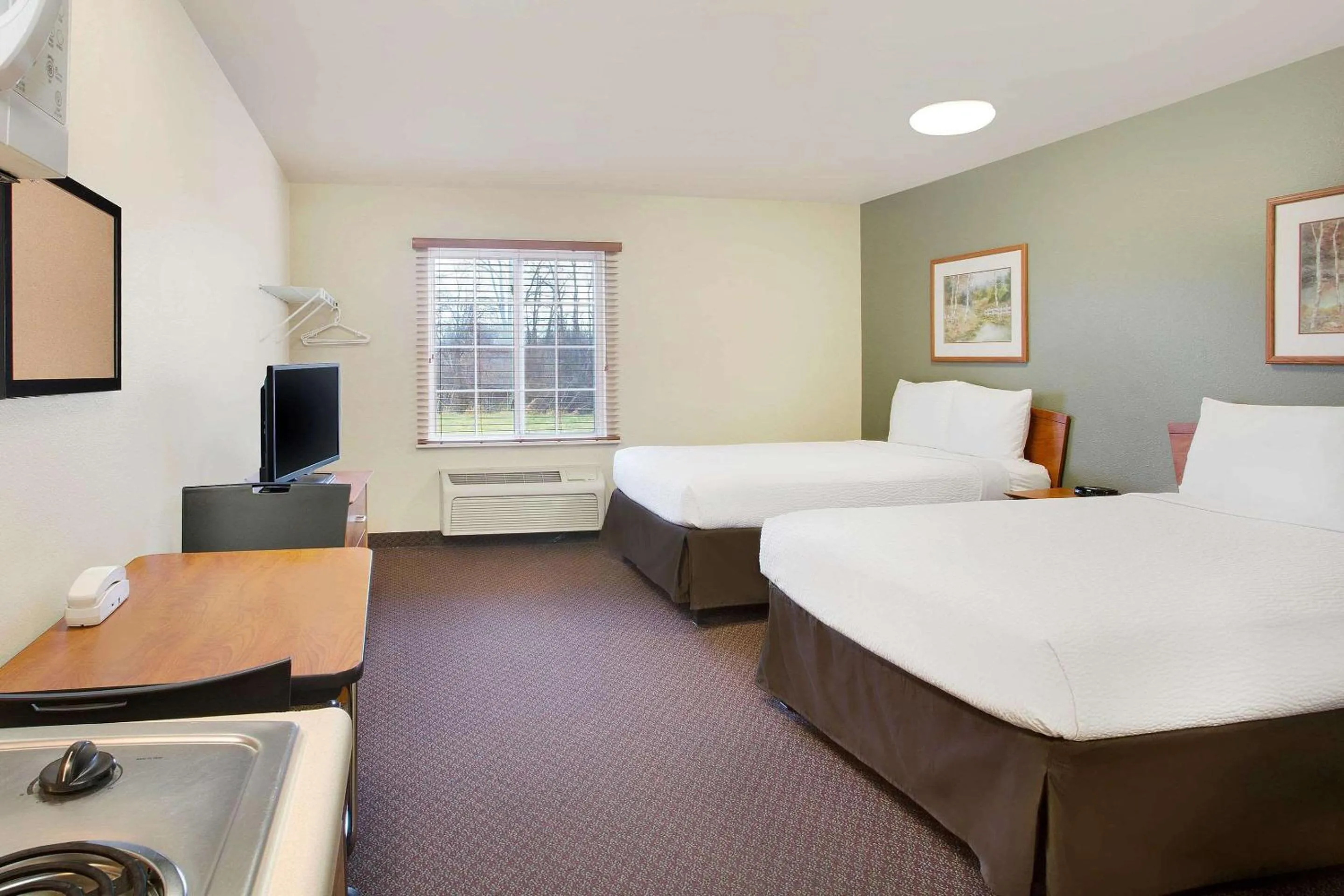 Photo of the whole room, Bed in WoodSpring Suites Cincinnati Fairfield