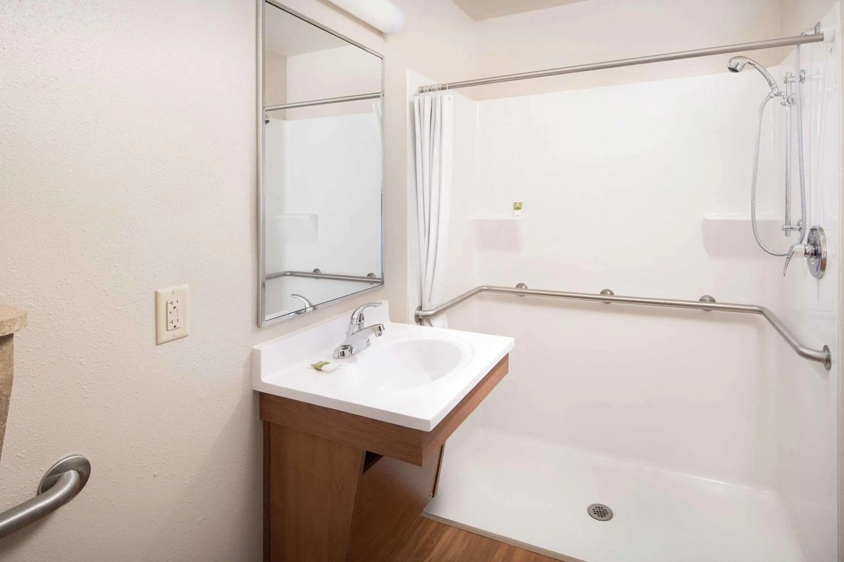 Bathroom in WoodSpring Suites Cincinnati Fairfield
