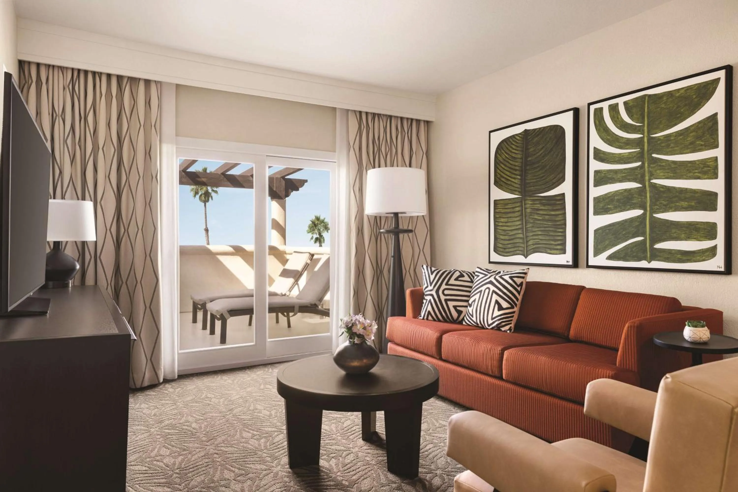 Living room in Zachari Dunes on Mandalay Beach, Curio Collection by Hilton