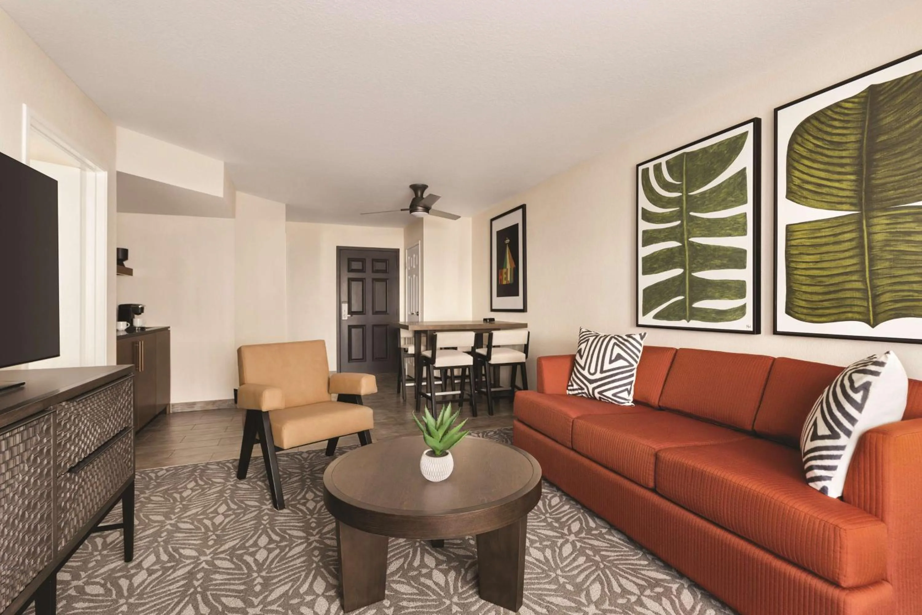 Living room in Zachari Dunes on Mandalay Beach, Curio Collection by Hilton