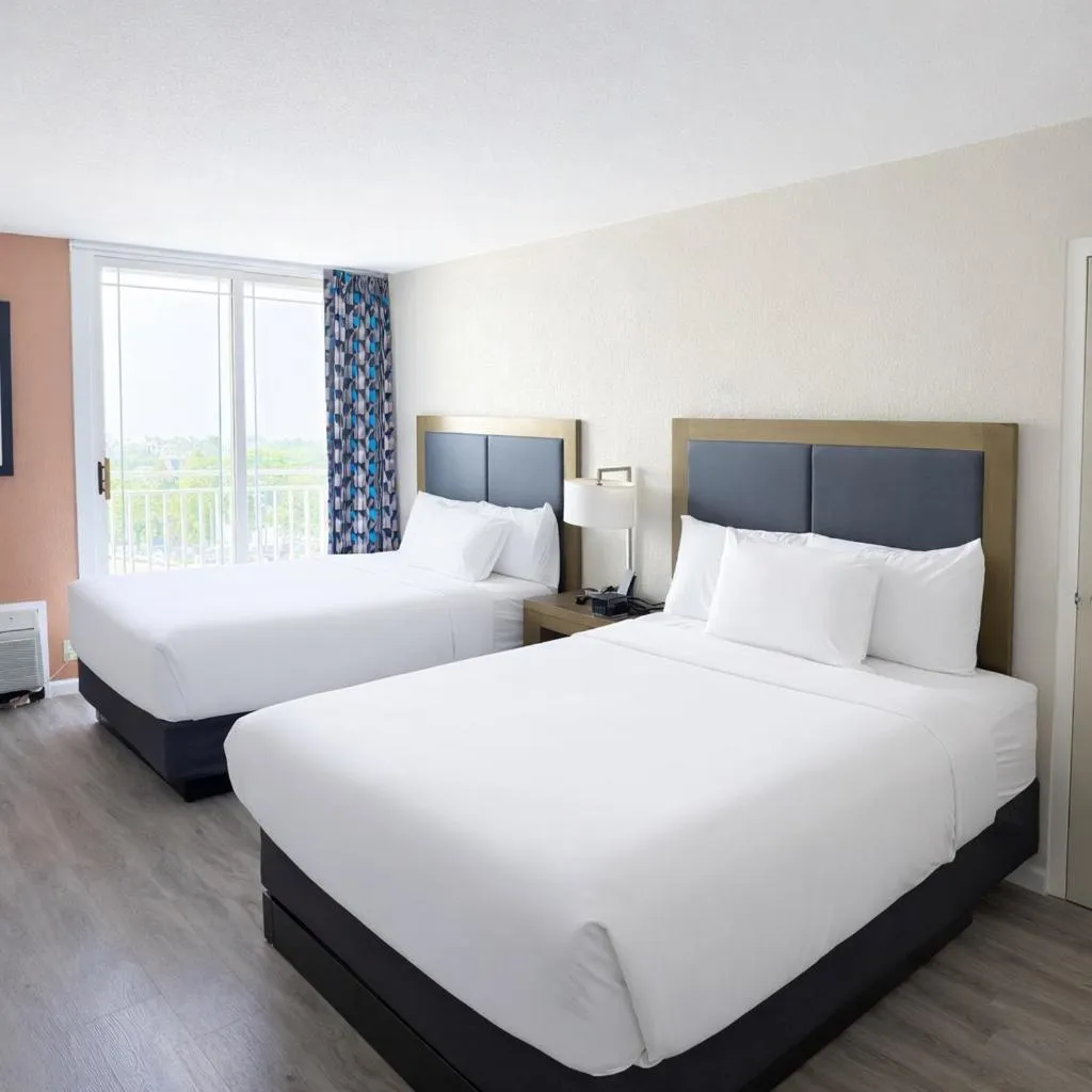 Bed in Silver Beach Hotel