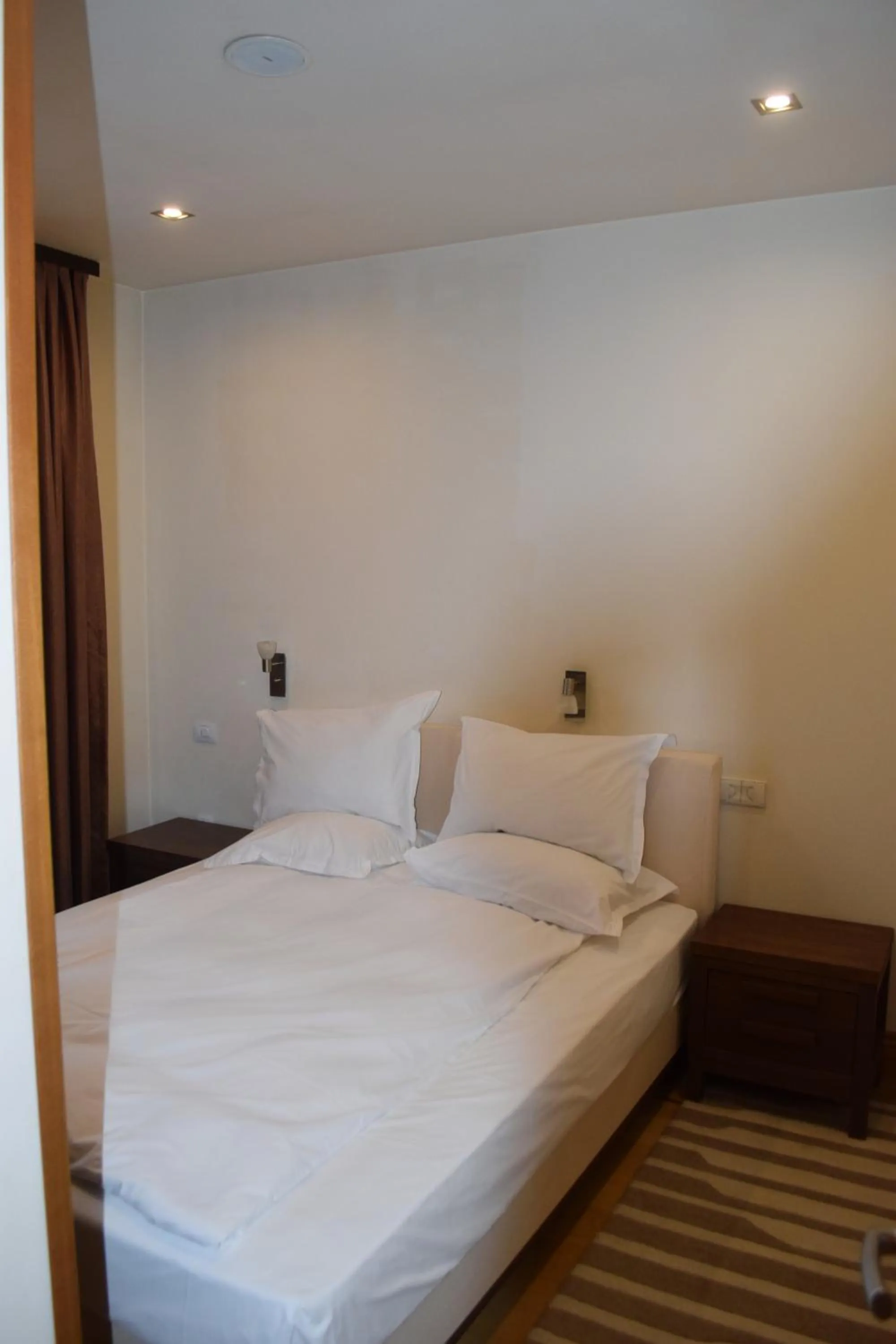 Bed in The Lodge Hotel