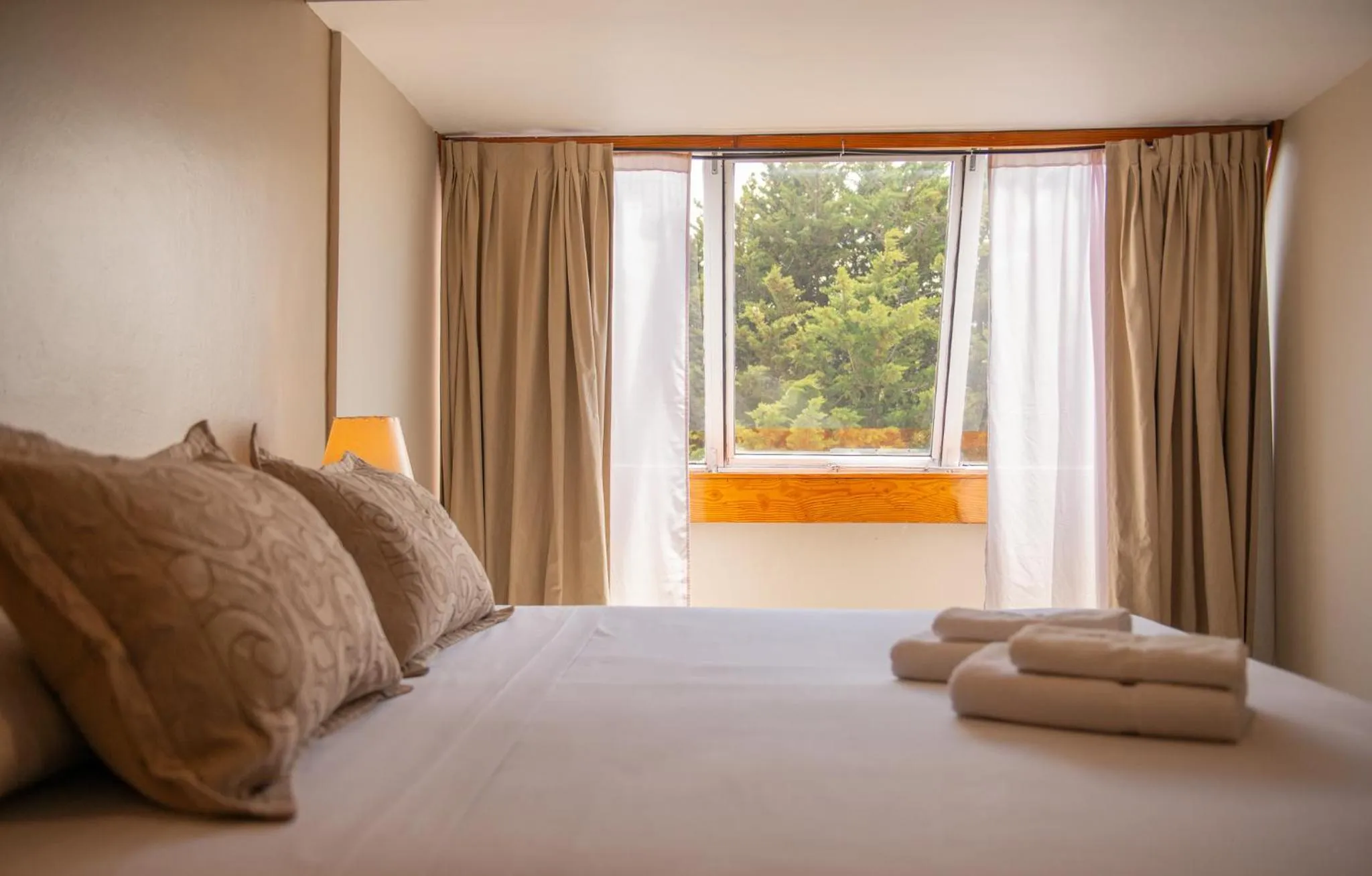 Photo of the whole room, Bed in Patagonia Hotel