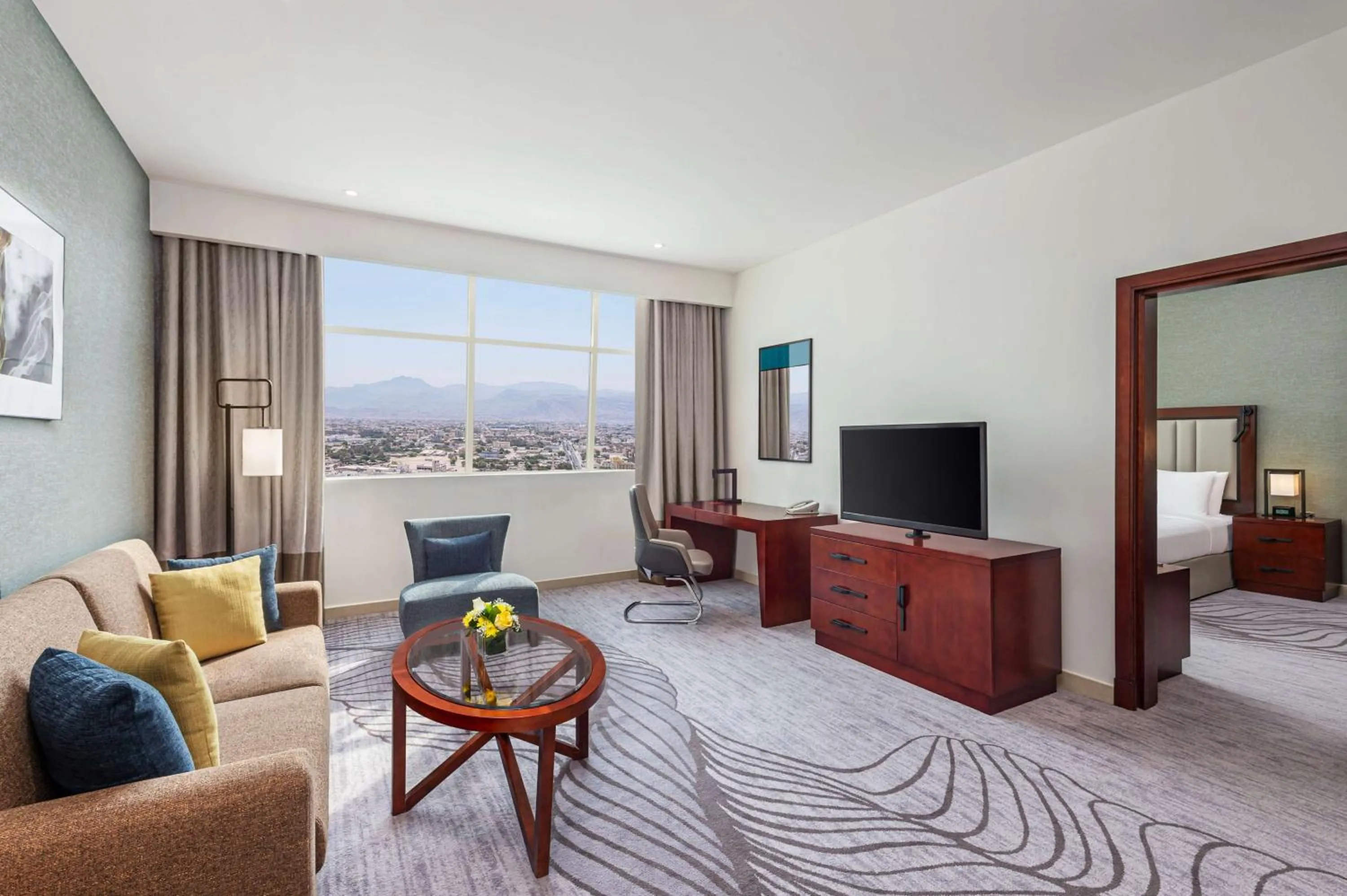 Bed, Seating Area in DoubleTree By Hilton Ras Al Khaimah