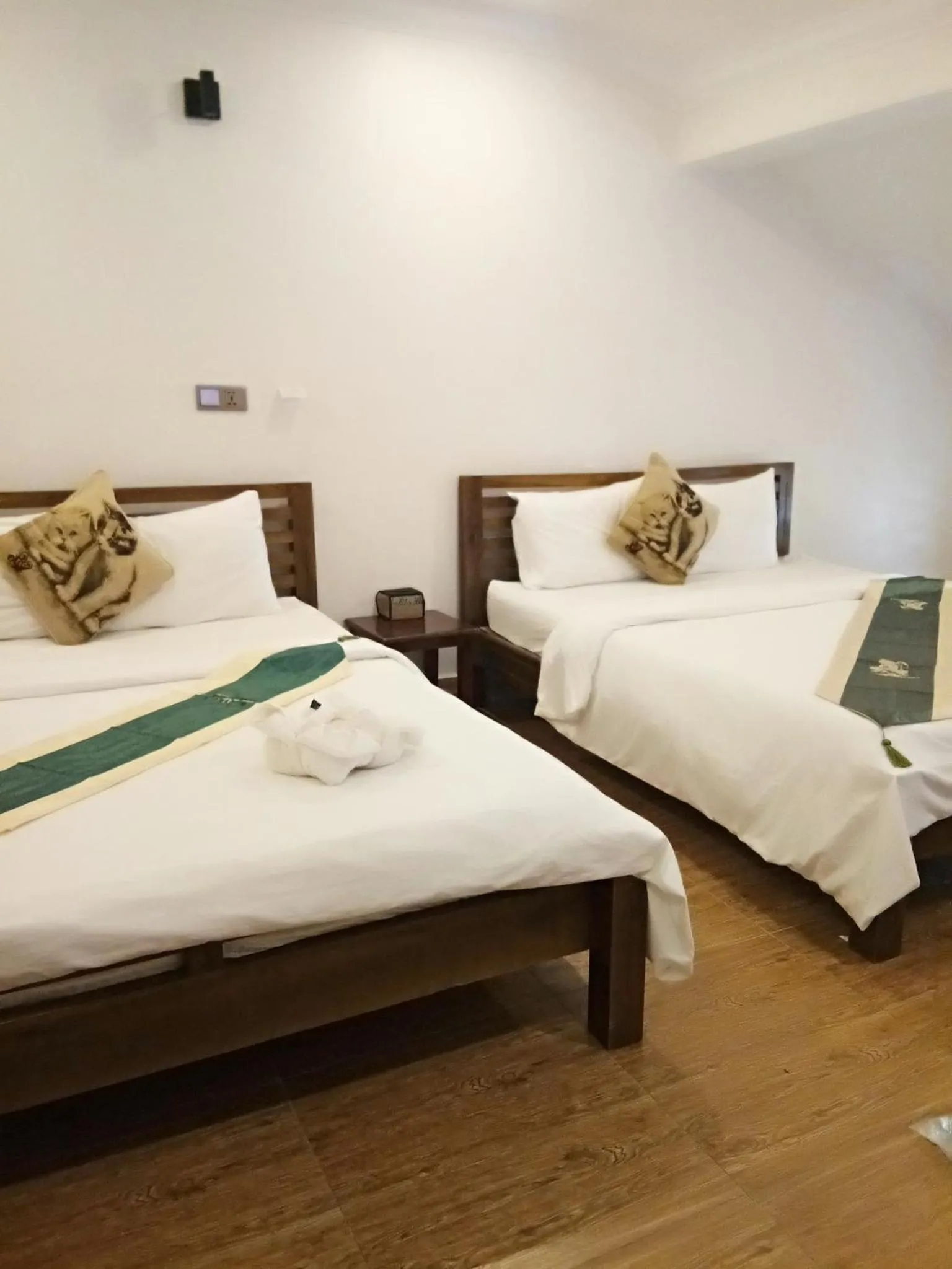 Bed in TWIN HOME Guesthouse