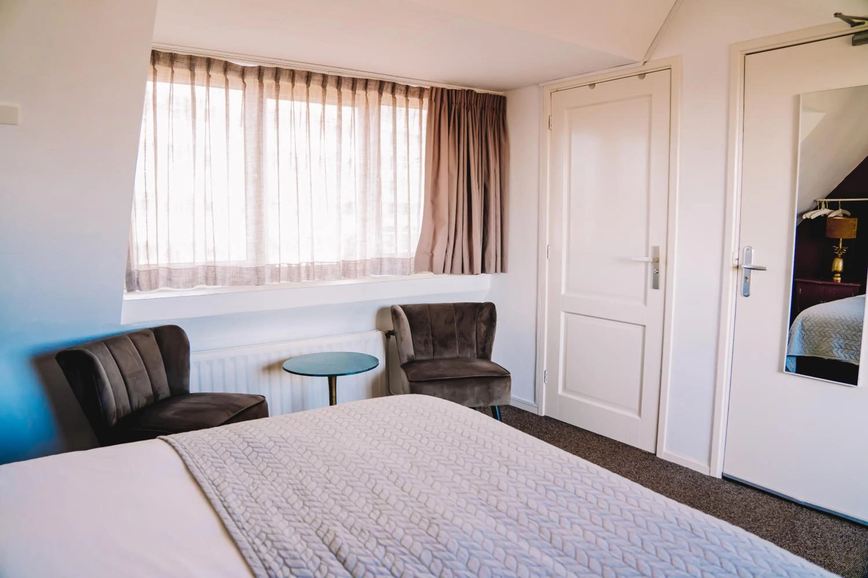 Photo of the whole room, Bed in Boutique Lodge Zandvoort