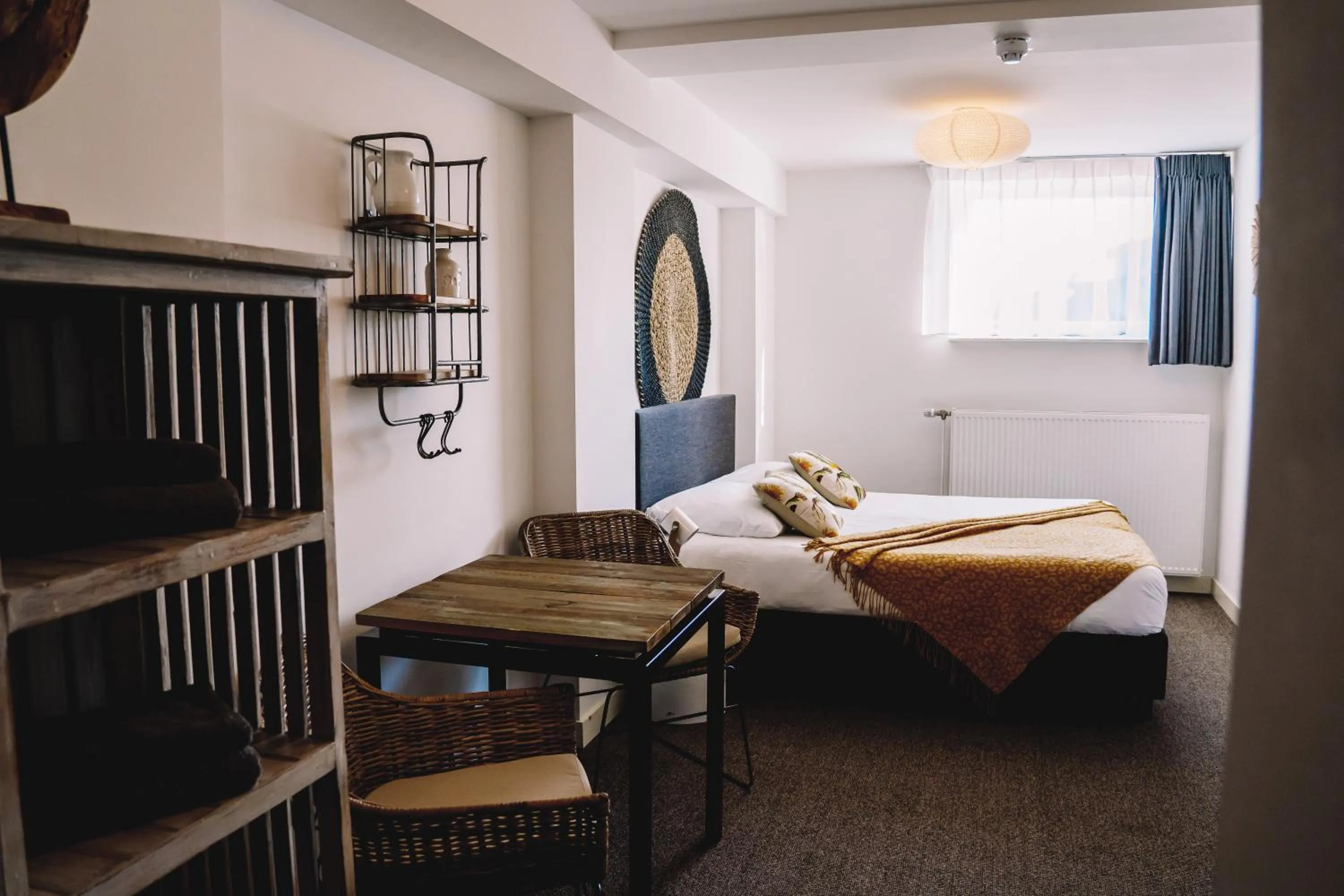 Seating area, Bed in Boutique Lodge Zandvoort