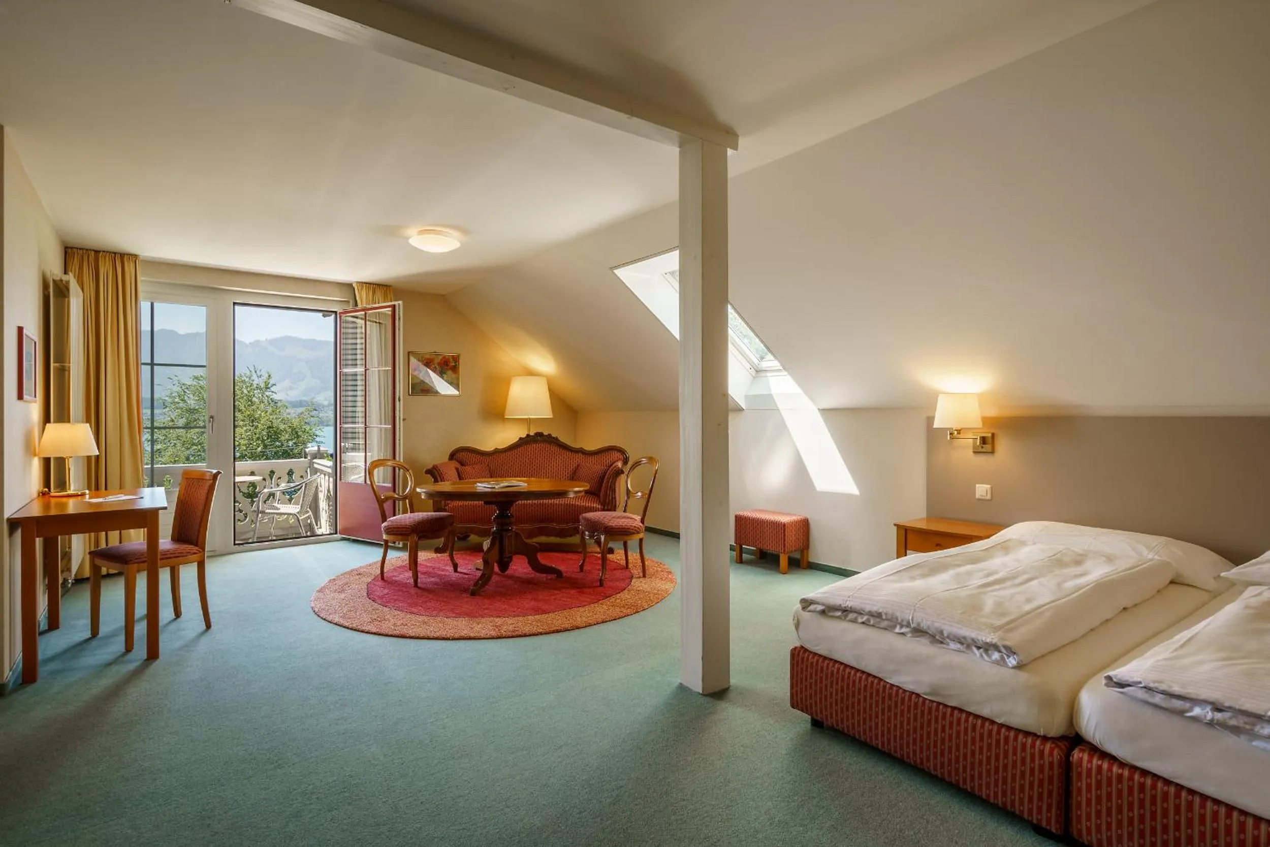 Photo of the whole room, Bed in Schönbühl Hotel & Restaurant Lake Thun