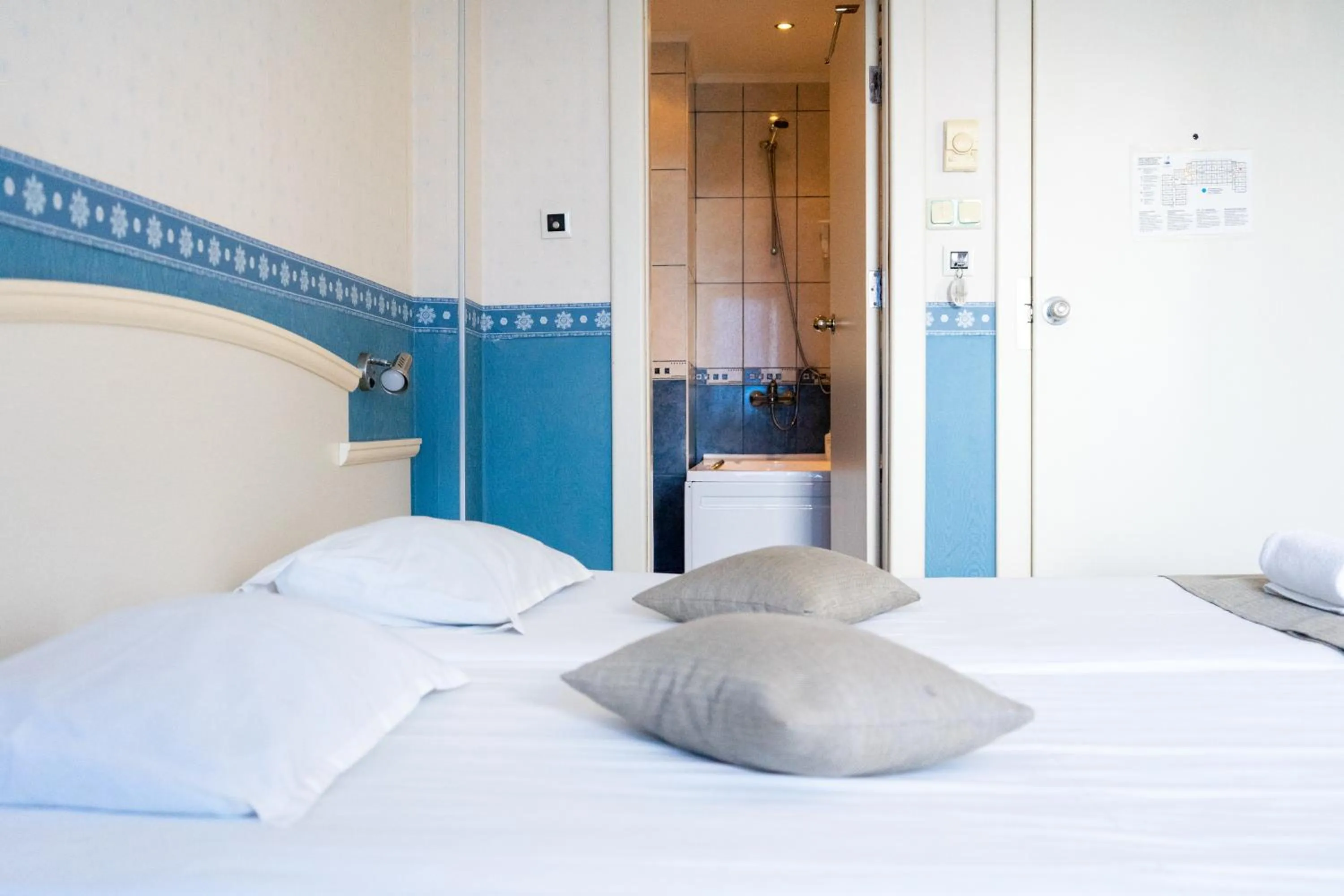 Bed in Aphrodite Hotel