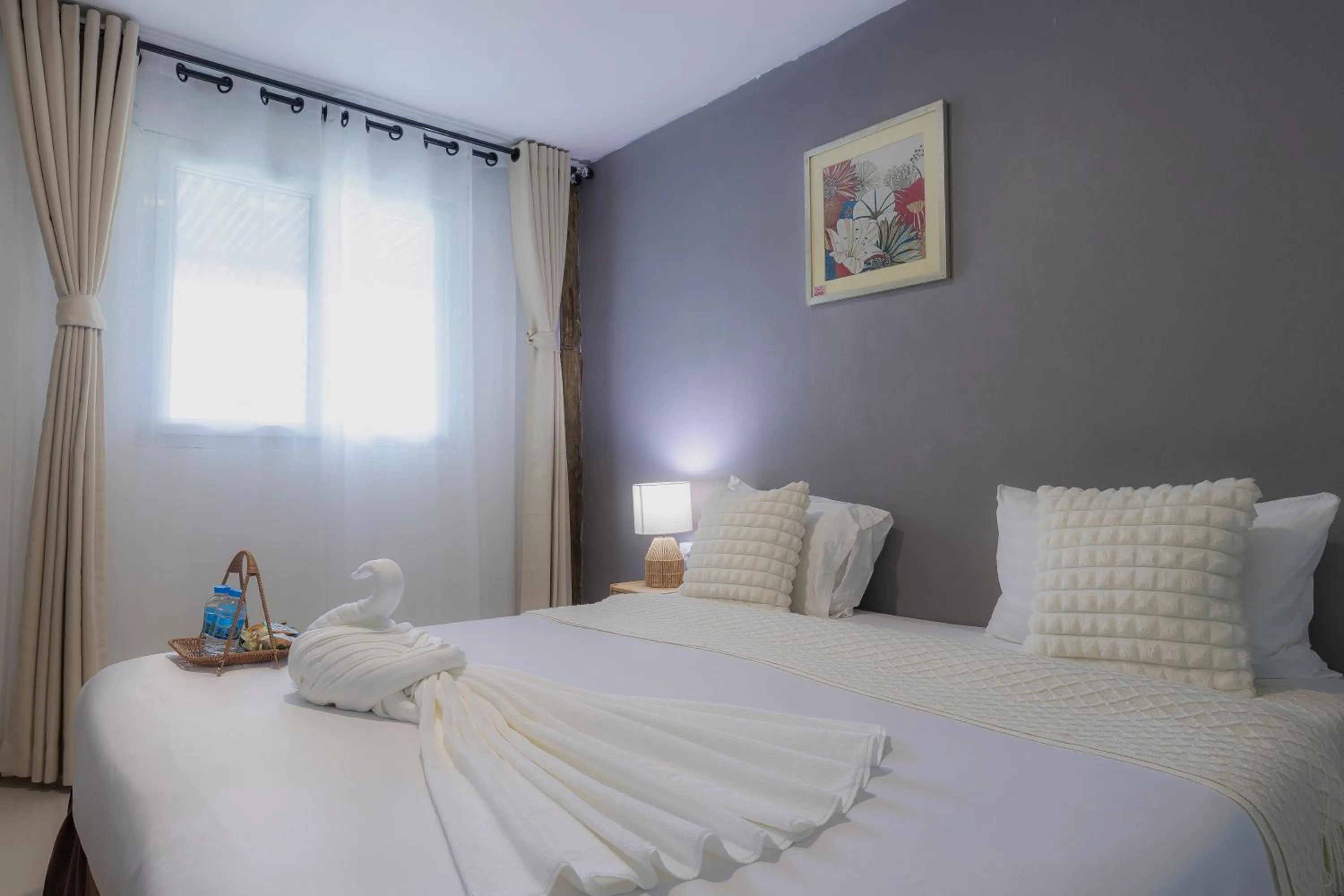 Bed in Phi Phi Cozy Seafront Resort