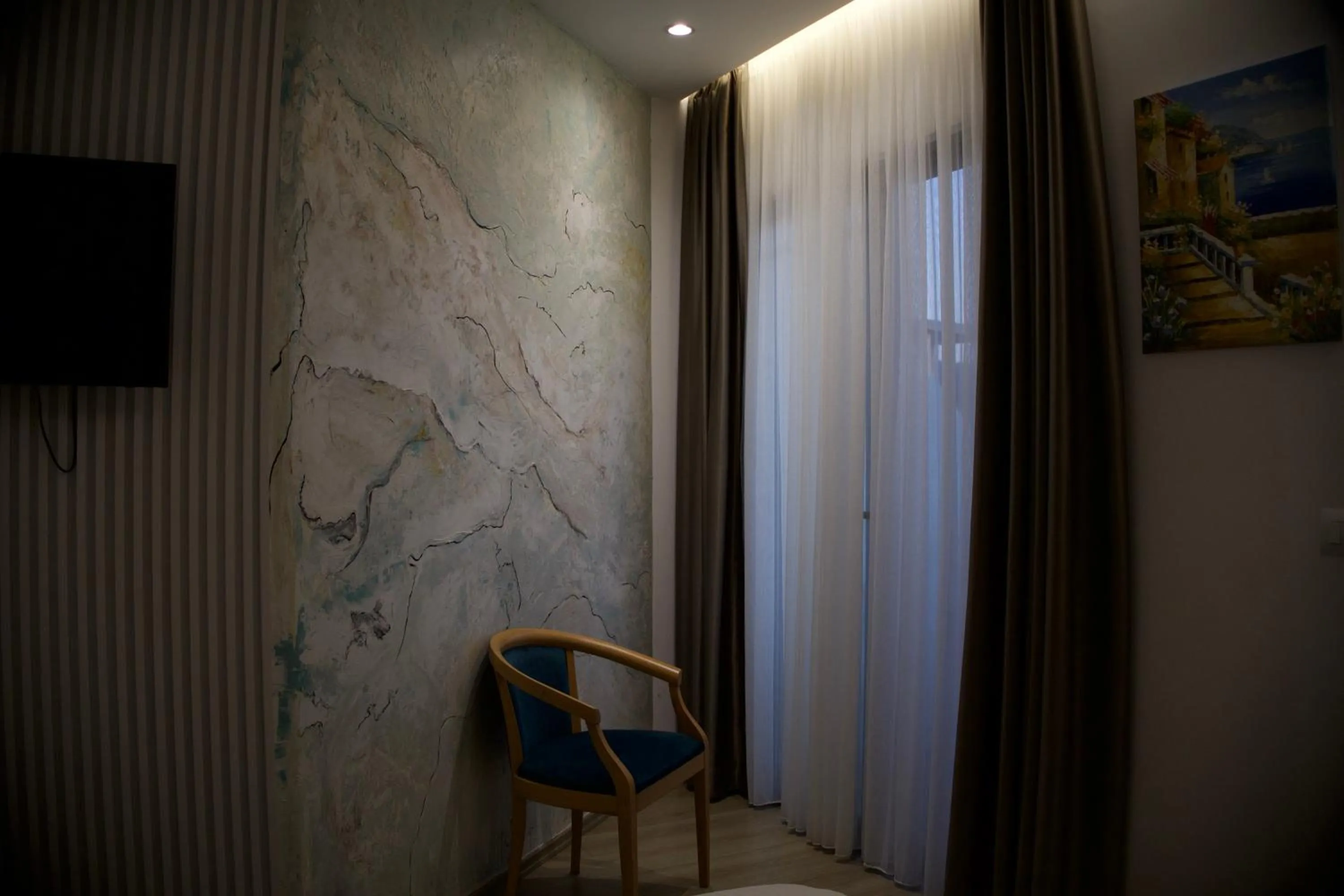 TV and multimedia in Ilio Boutique Hotel