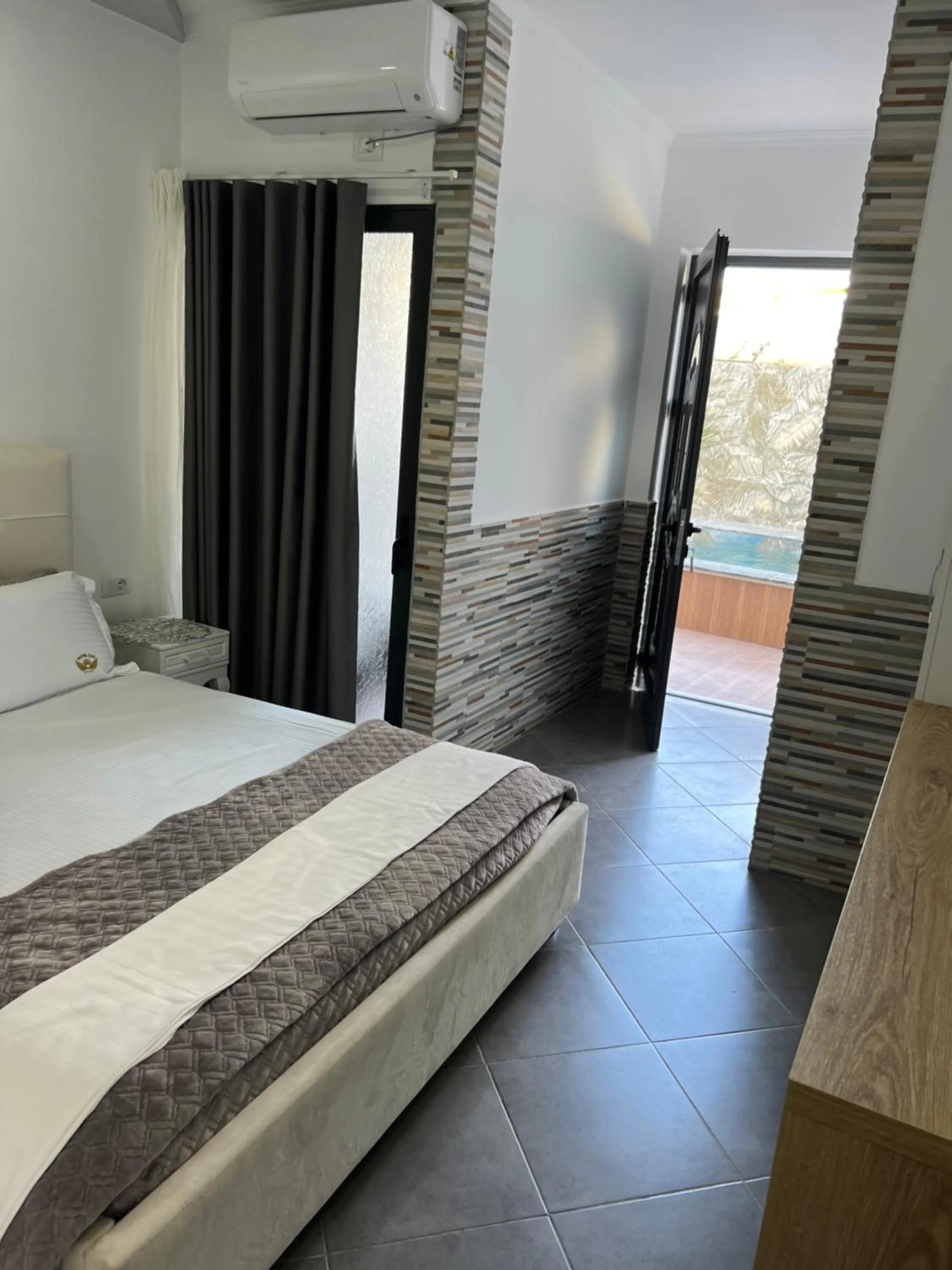 Bed in Ilio Boutique Hotel