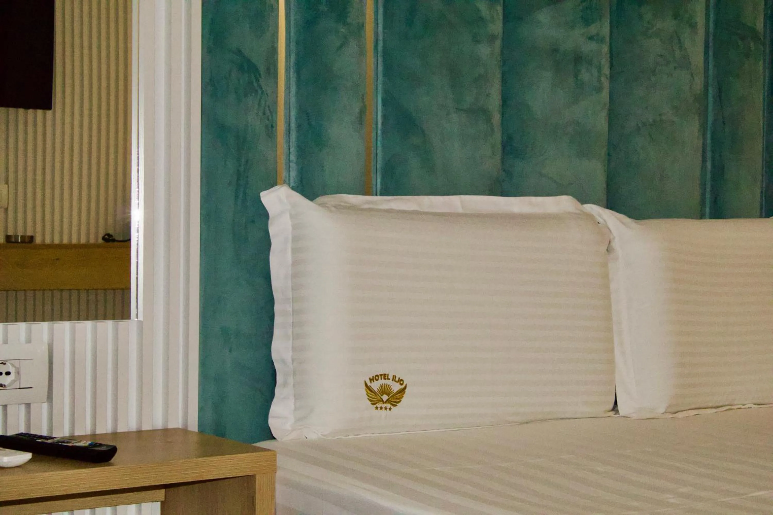 Photo of the whole room, Bed in Ilio Boutique Hotel