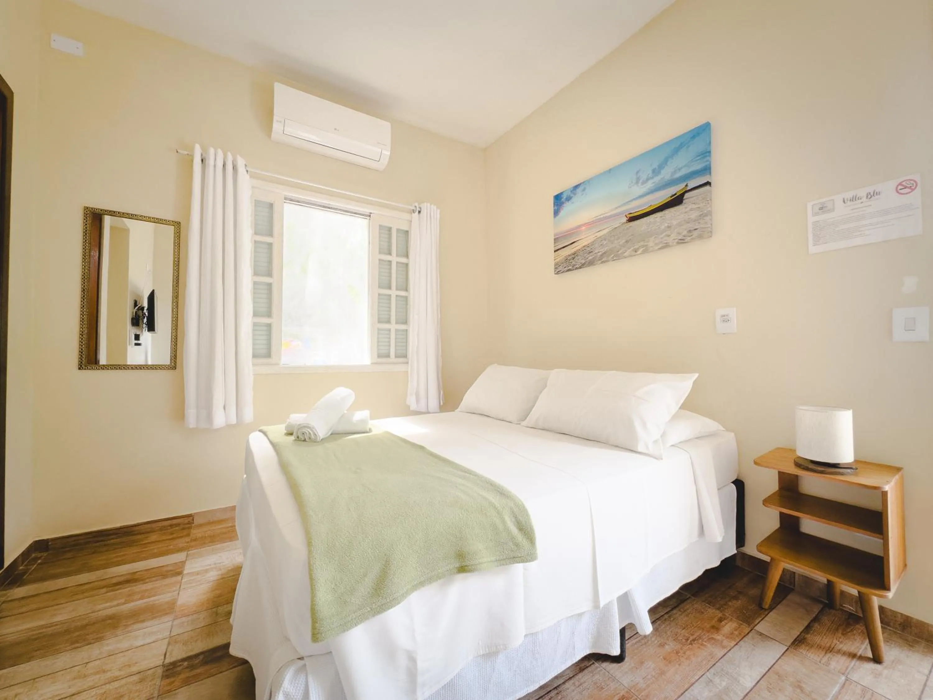 Bed in Pousada Villa Blu Maresias