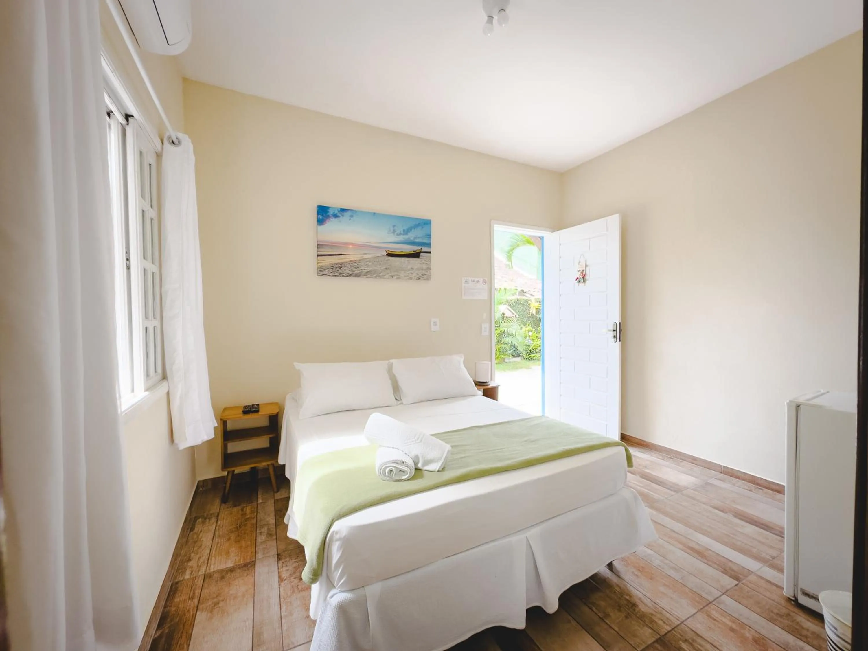 Bed in Pousada Villa Blu Maresias