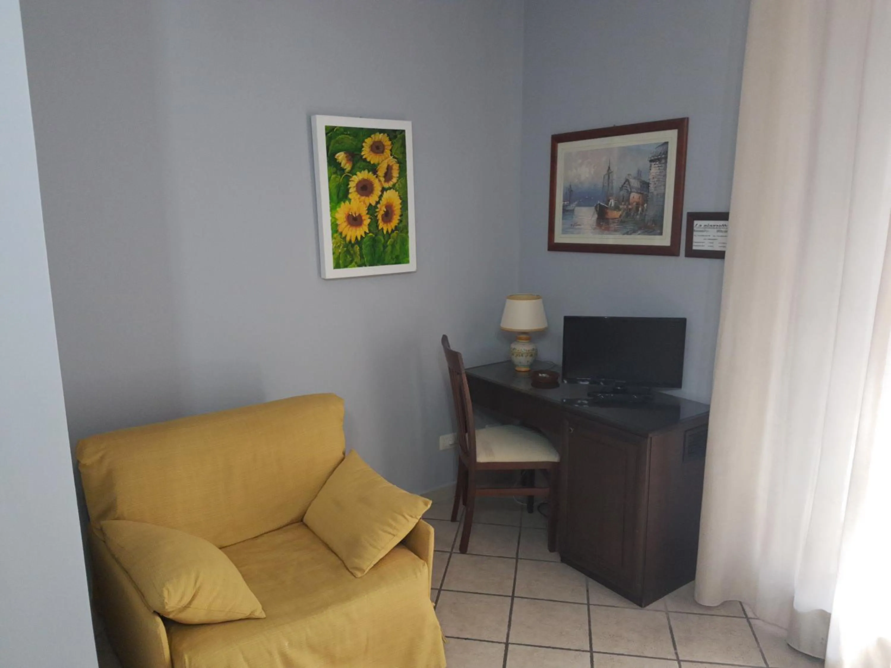 TV and multimedia in Affittacamere La Piazzetta