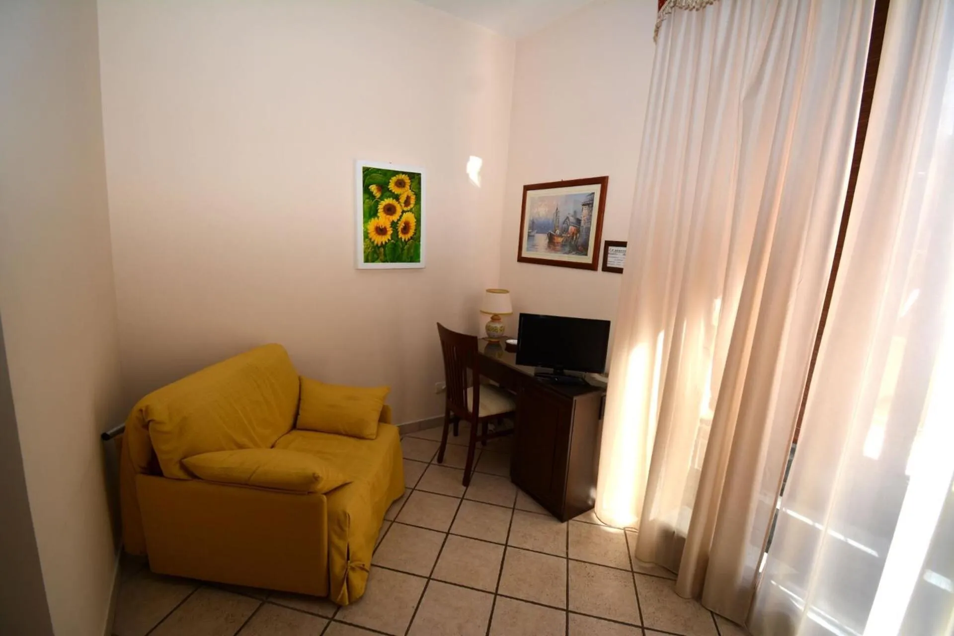 Photo of the whole room in Affittacamere La Piazzetta