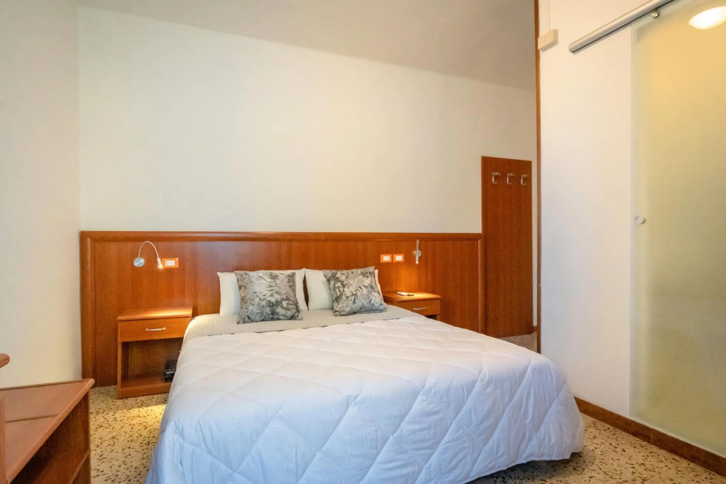 Bed in Hotel Portofino