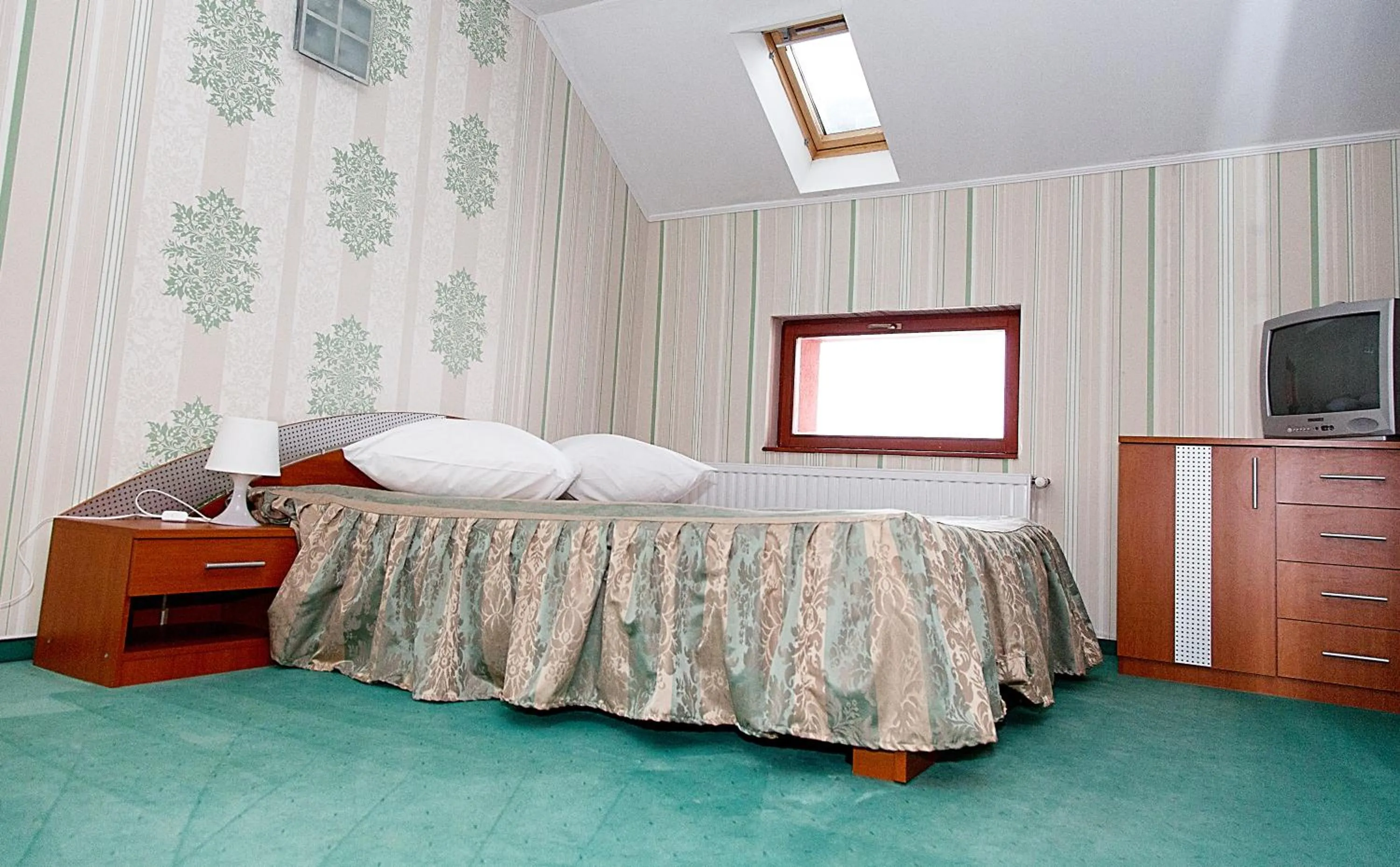 Living room, Bed in Hotel Rusu