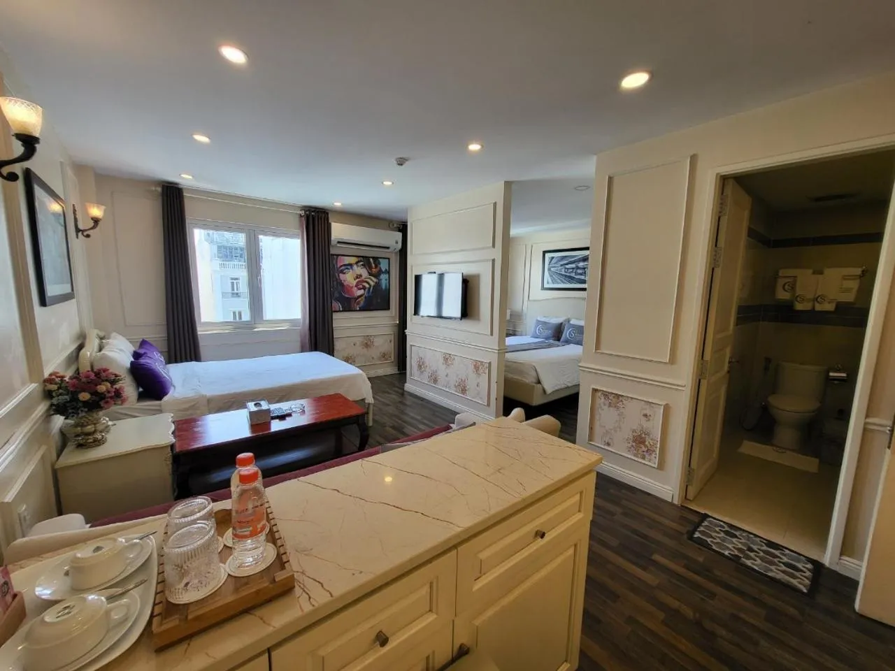 Bed in Saigon By Night Luxury Hotel