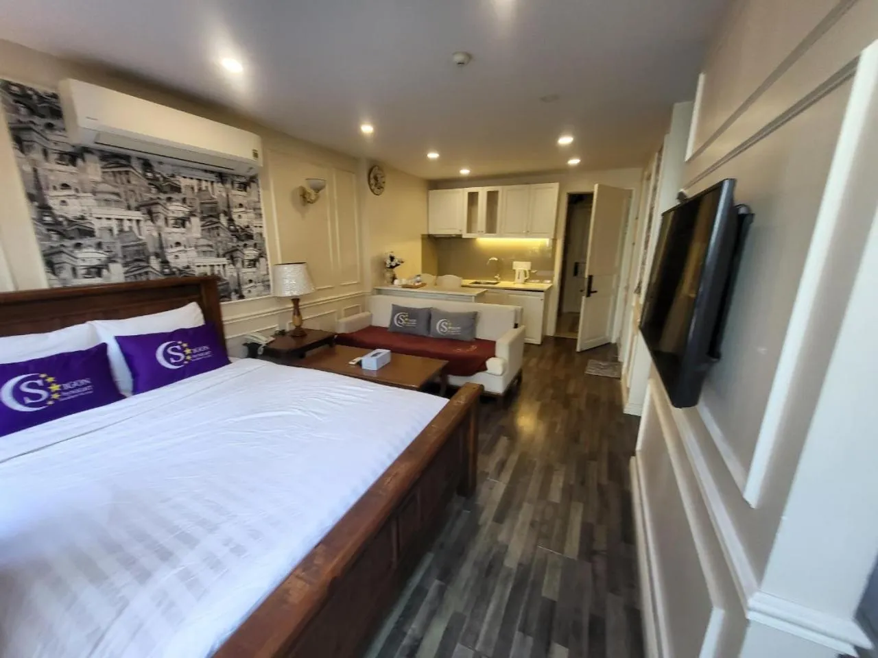 Bed in Saigon By Night Luxury Hotel