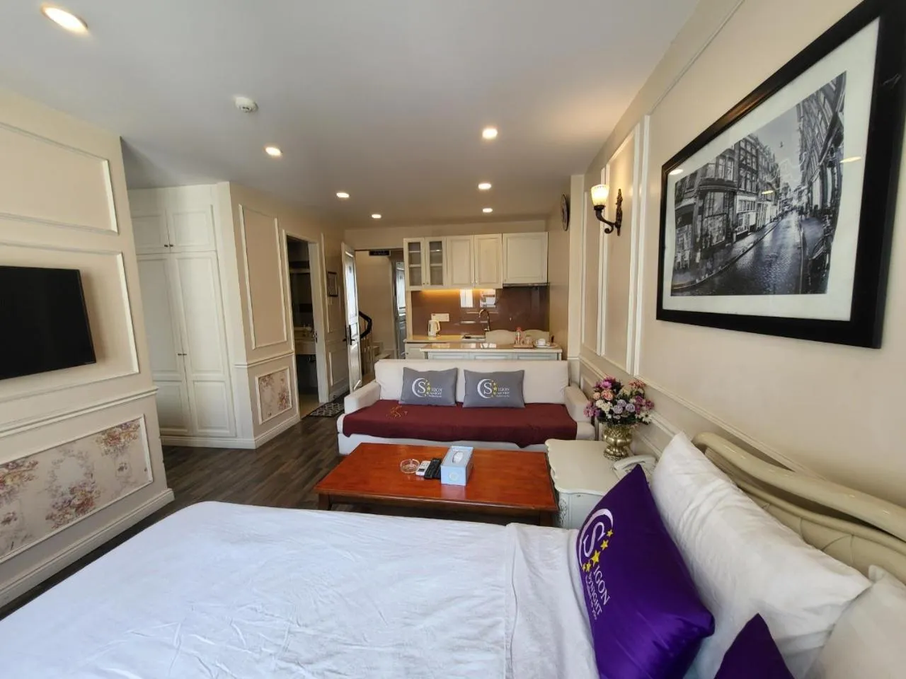 Bed in Saigon By Night Luxury Hotel