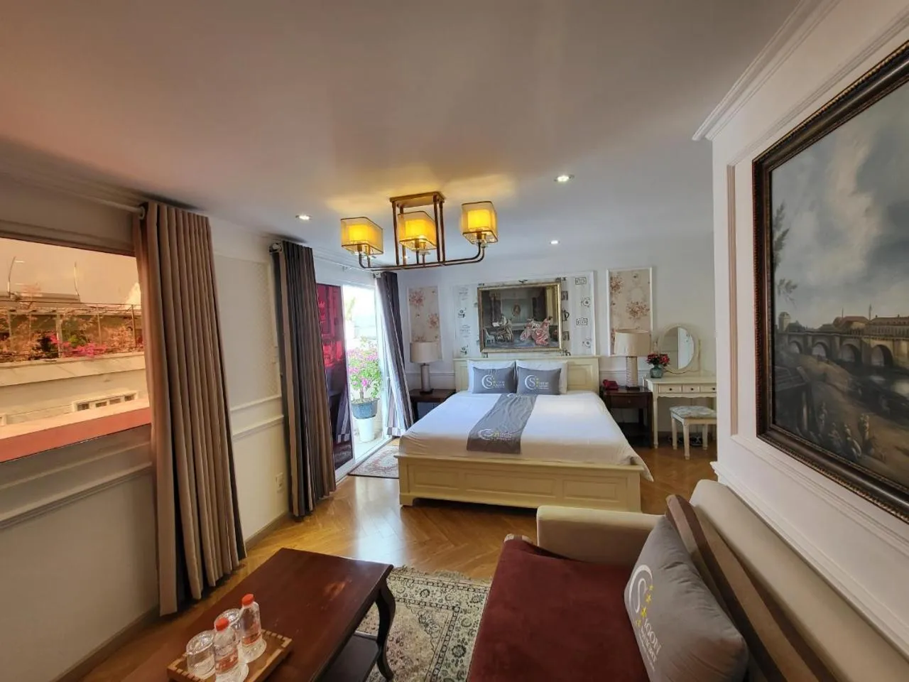 Bed in Saigon By Night Luxury Hotel