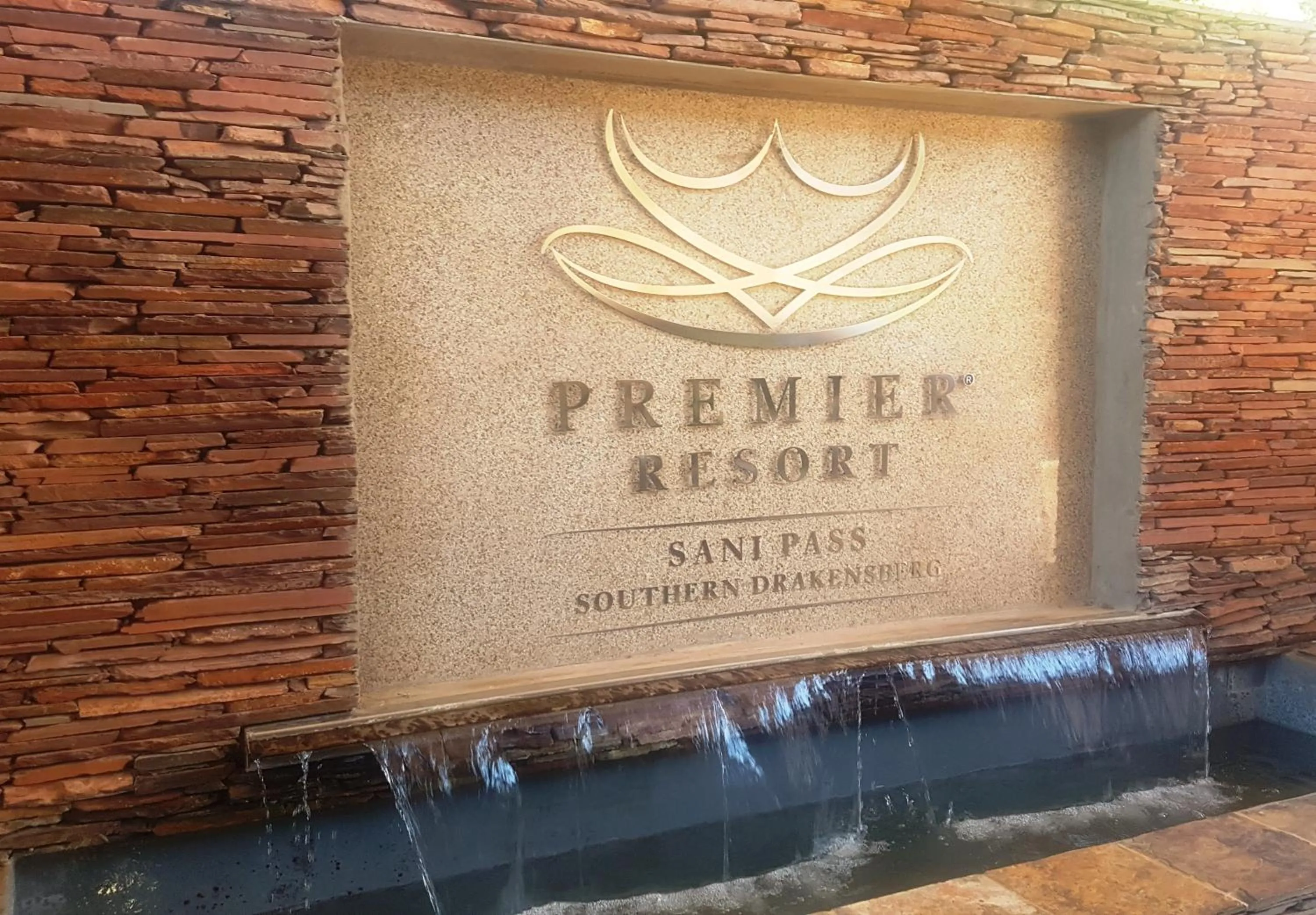Property logo or sign in Premier Resort Sani Pass