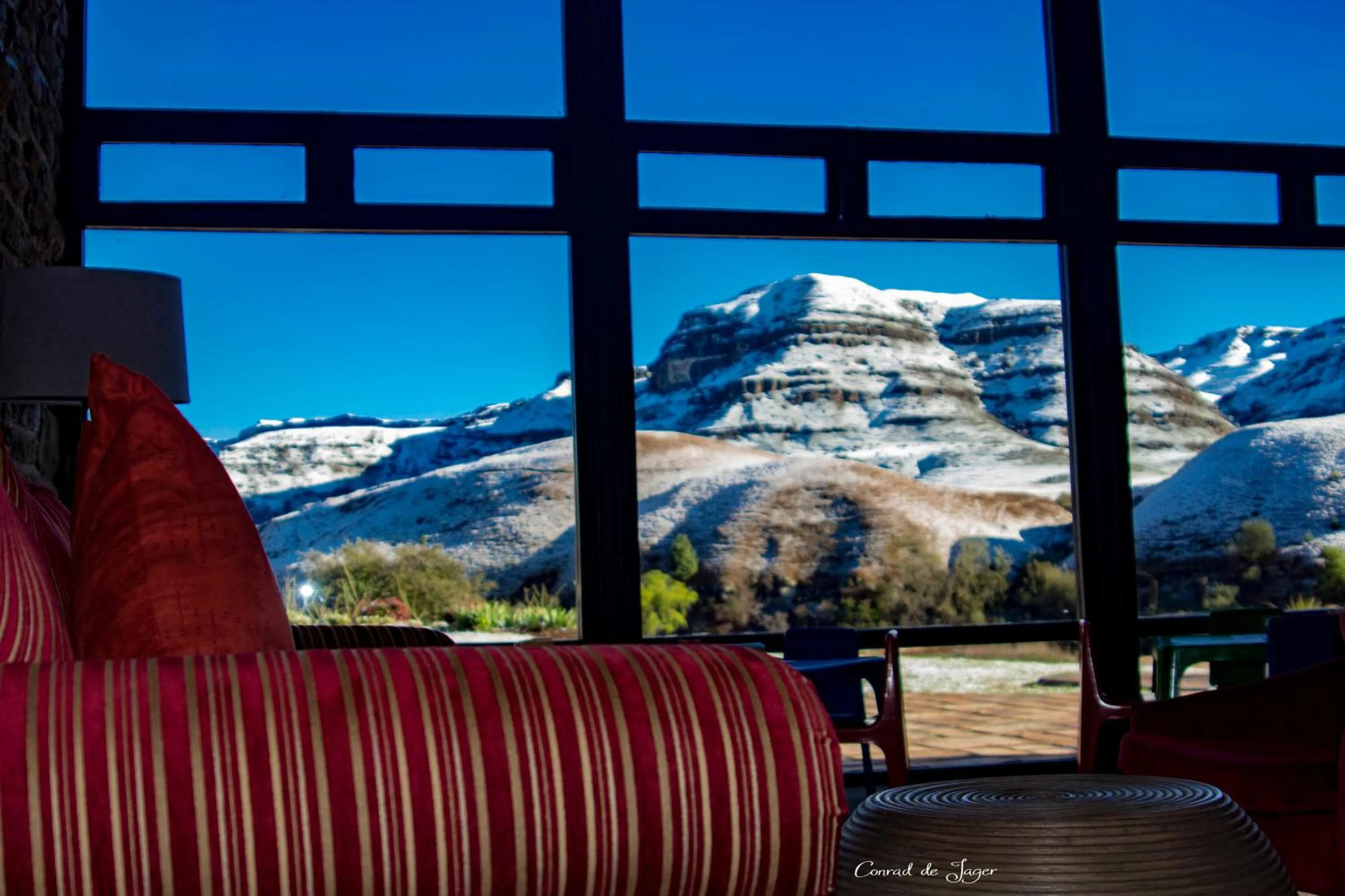 Communal lounge/ TV room in Premier Resort Sani Pass