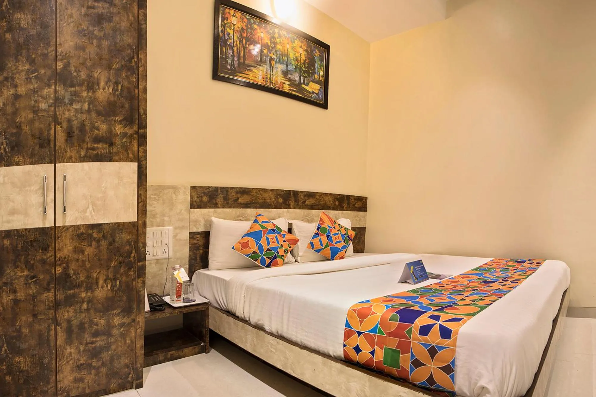 Bed in FabHotel Embassy Grand