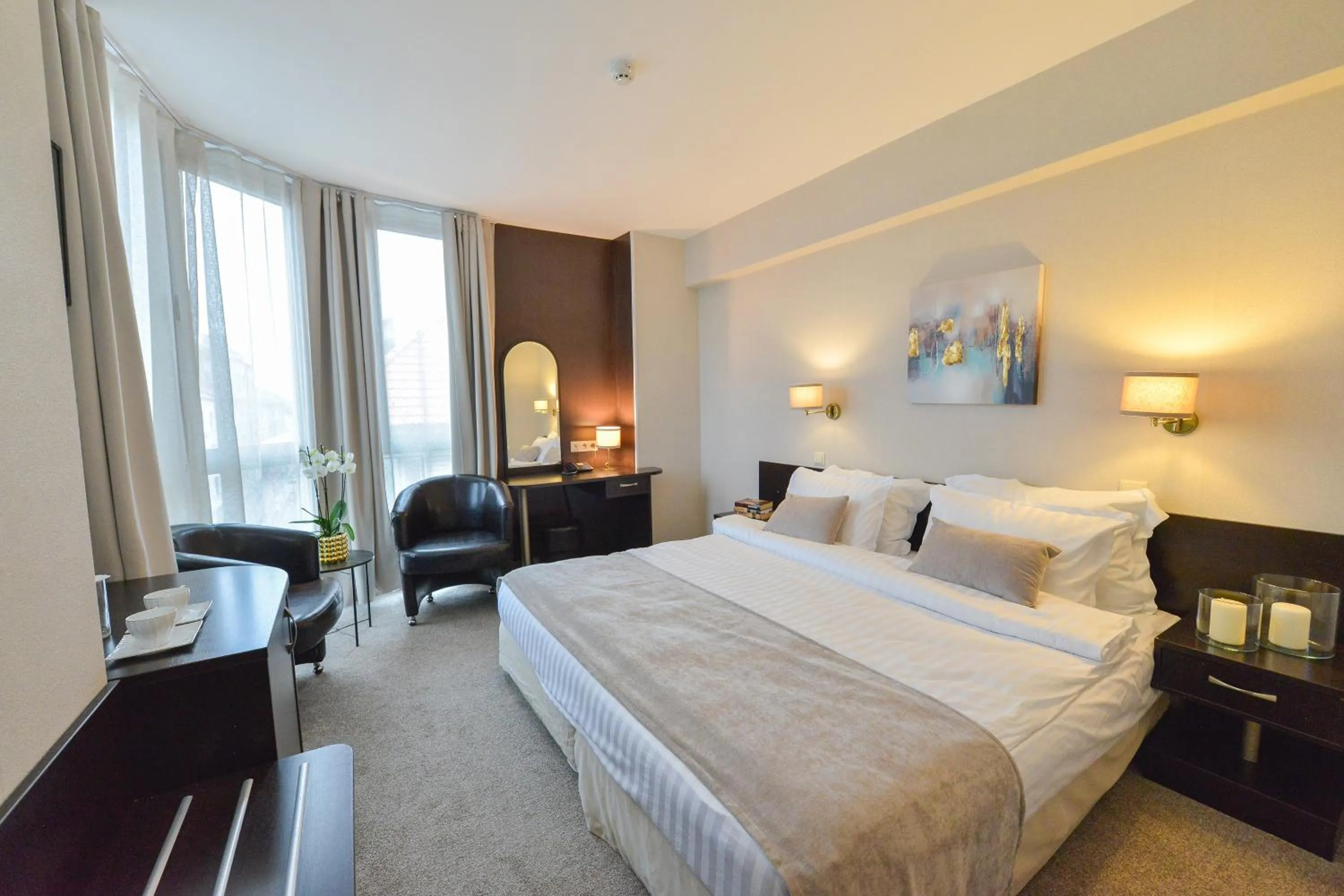 Bed in Art Plaza Hotel