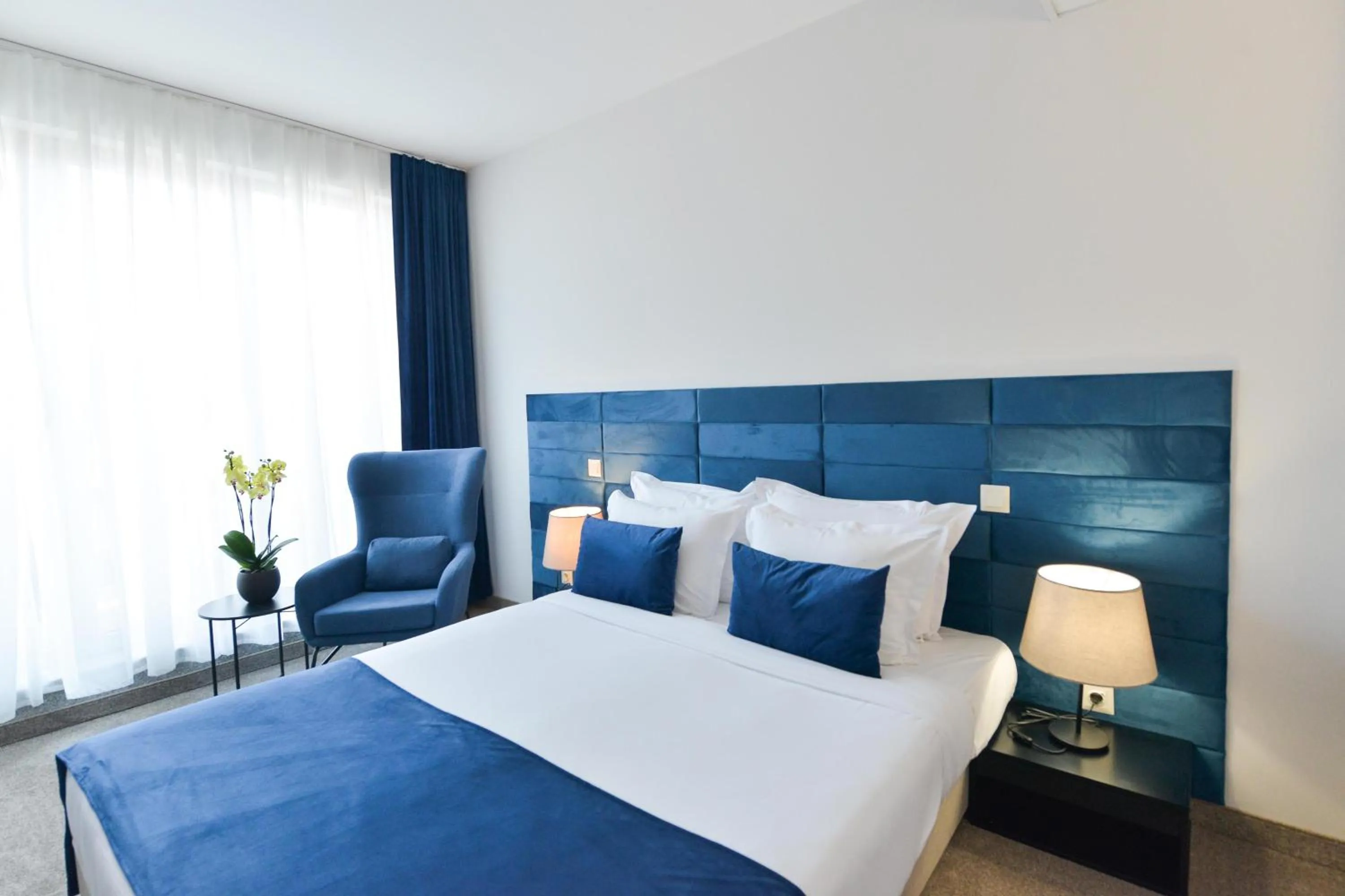 Bed in Art Plaza Hotel