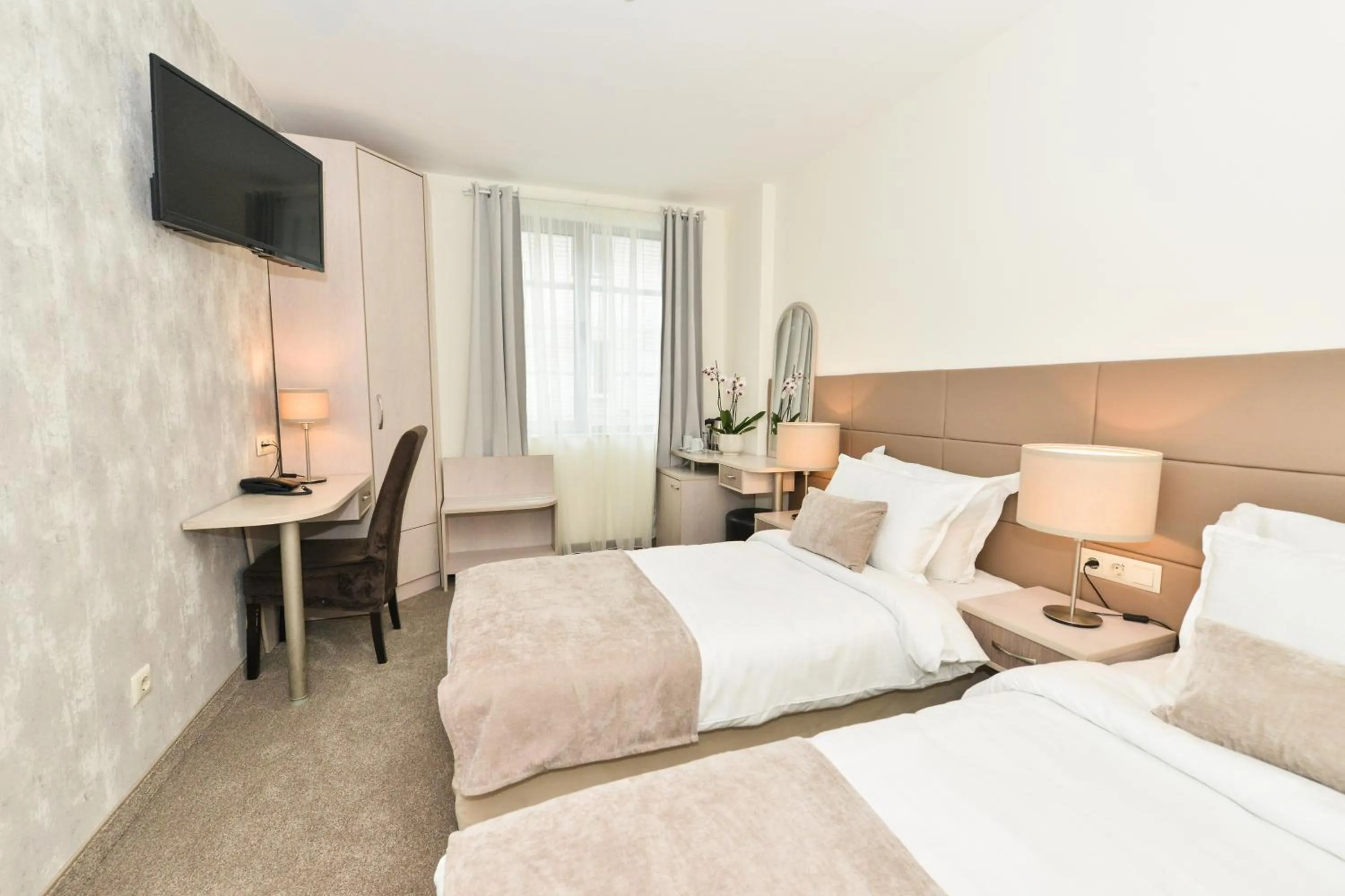 Bed in Art Plaza Hotel