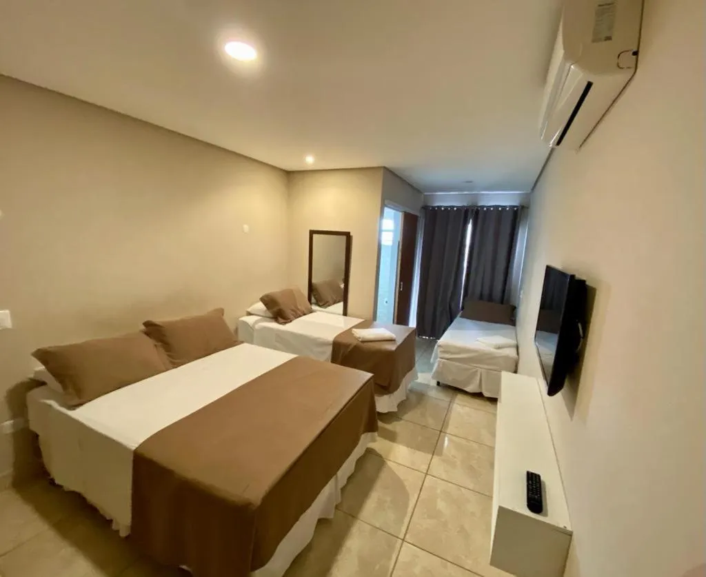 Photo of the whole room, Bed in Don Marcos Hotel com Restaurante e Pizzaria