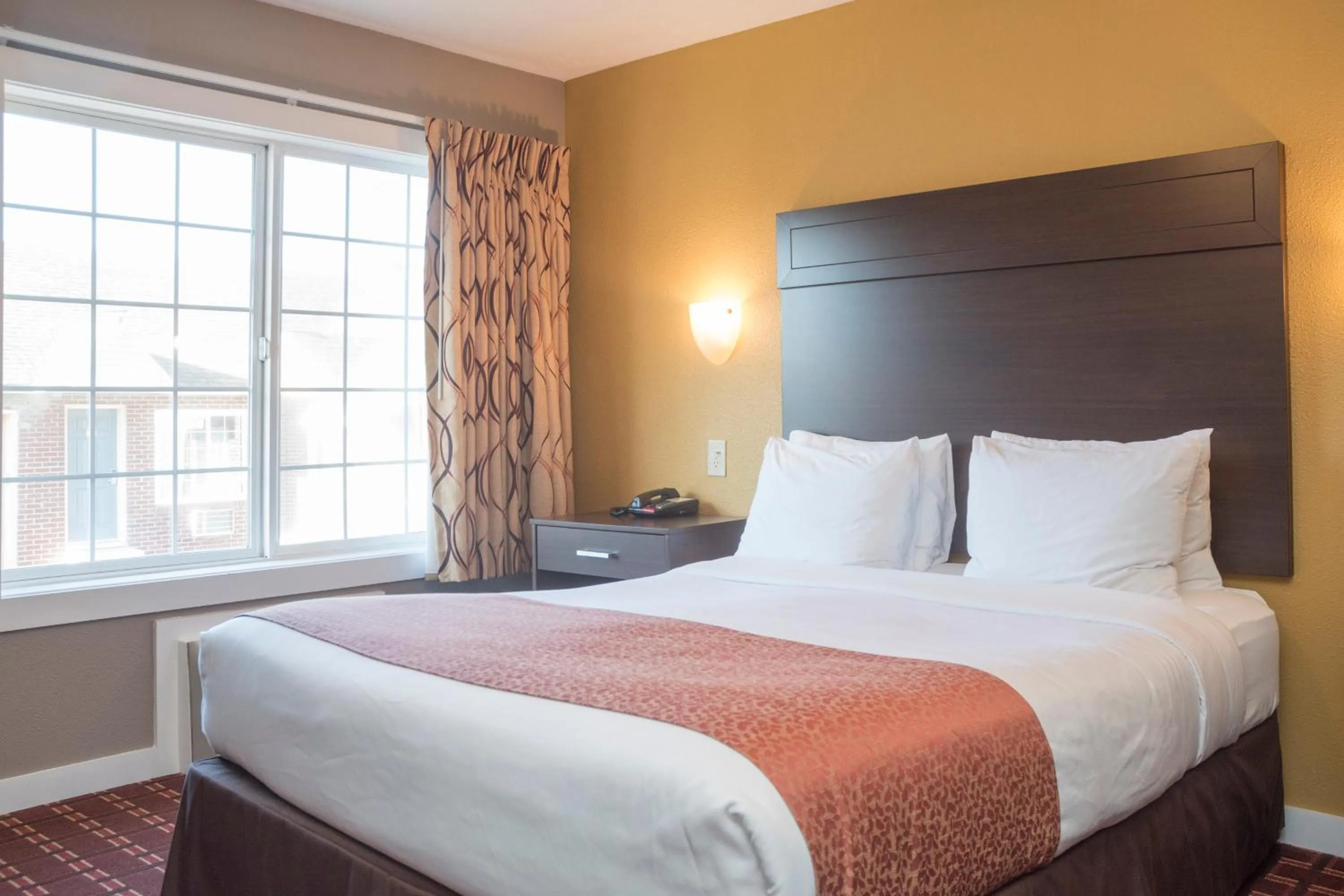 Bed in Capitol Hill Motel