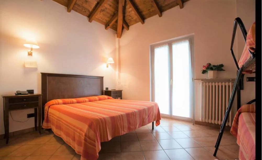 Bed in Hotel La Locanda