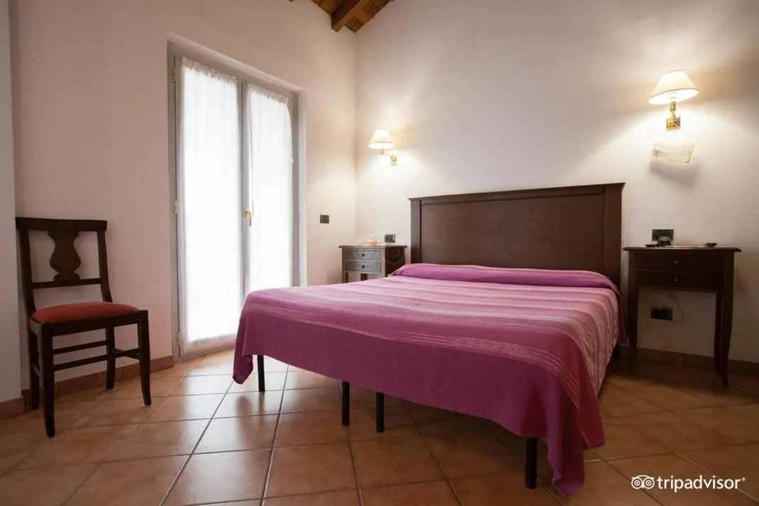 Bed in Hotel La Locanda