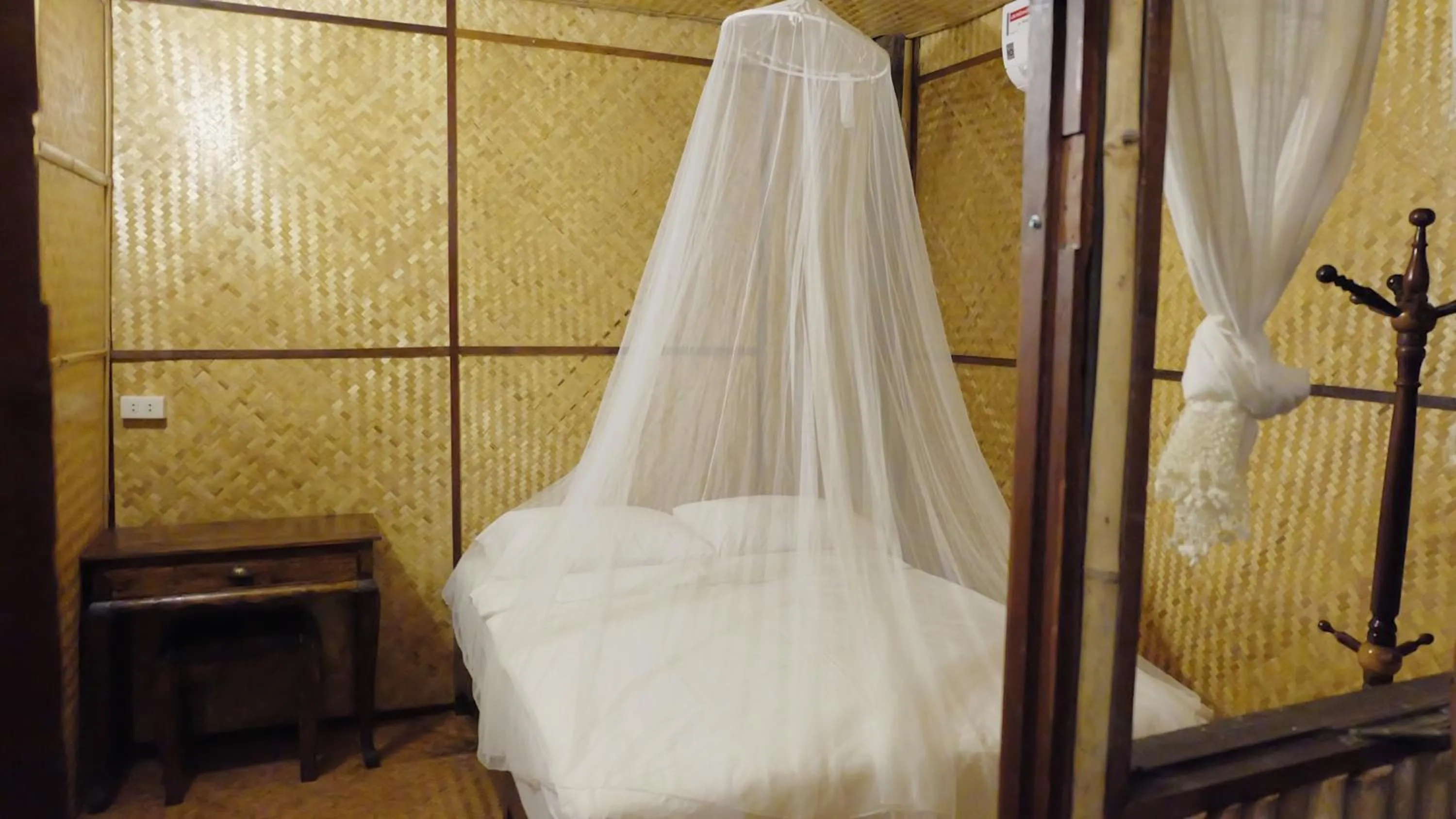 Bed in Lanna House Lanna Hut Chiangmai