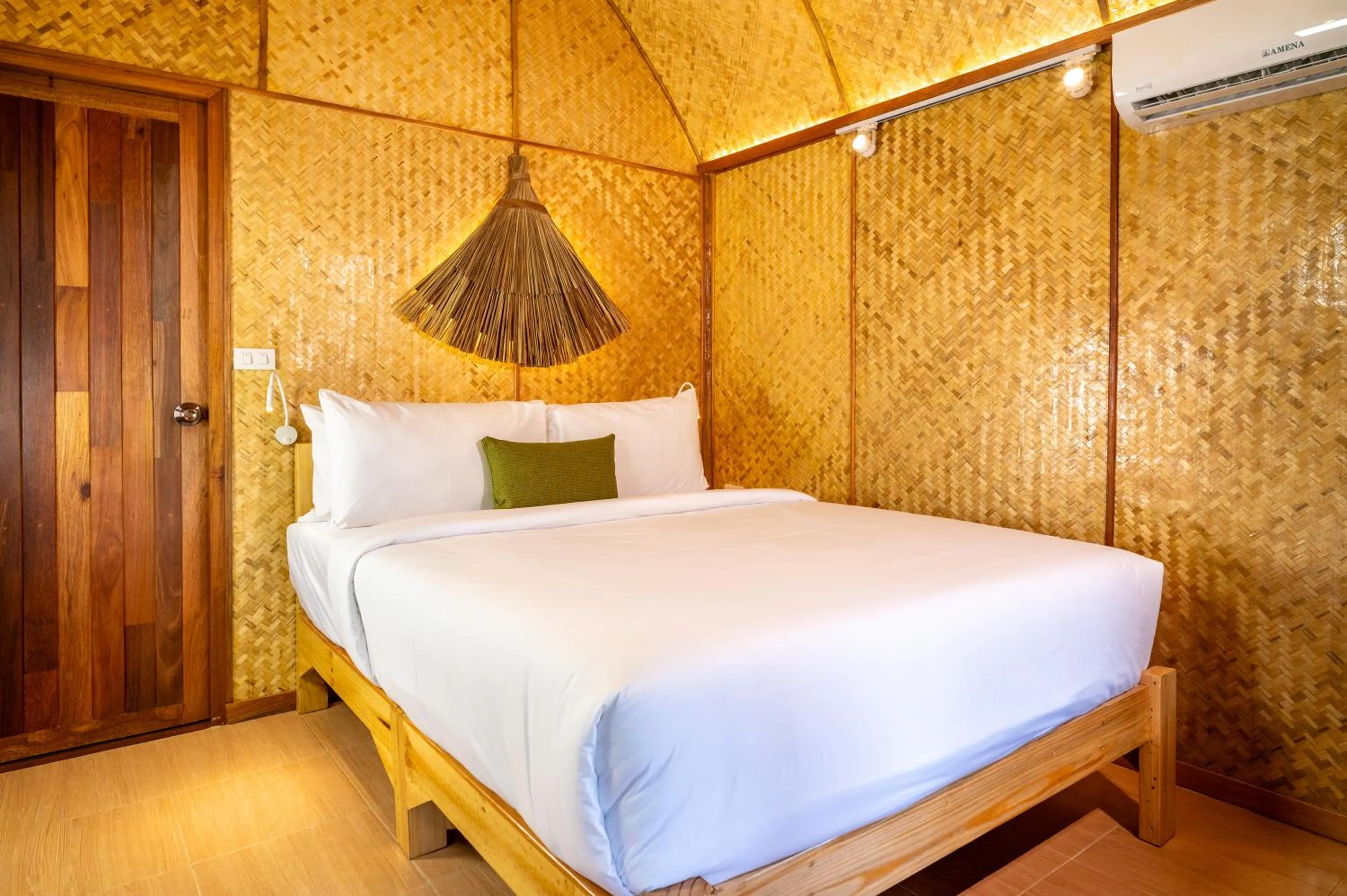 Bed in Pai Village Boutique Resort