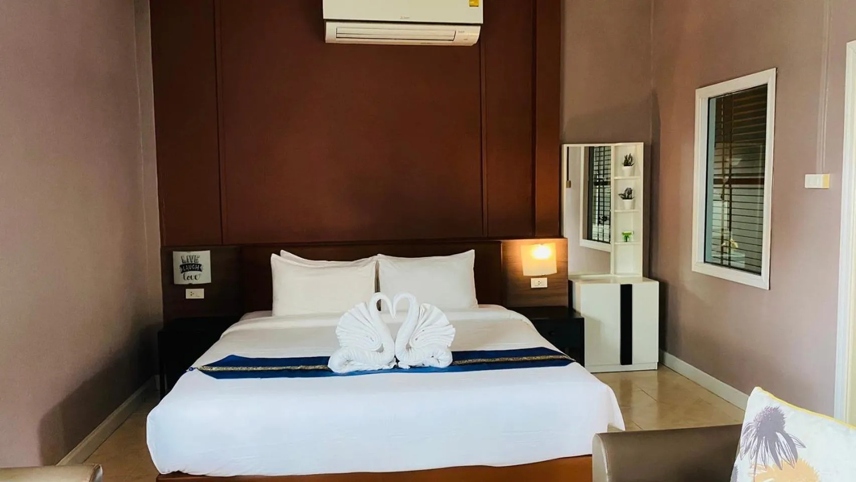 Bed in Bella Vista Beach Resort Koh Lipe