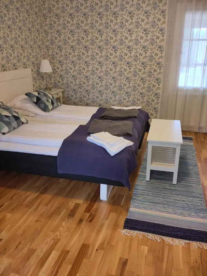 Photo of the whole room, Bed in Ödevata Gårdshotell