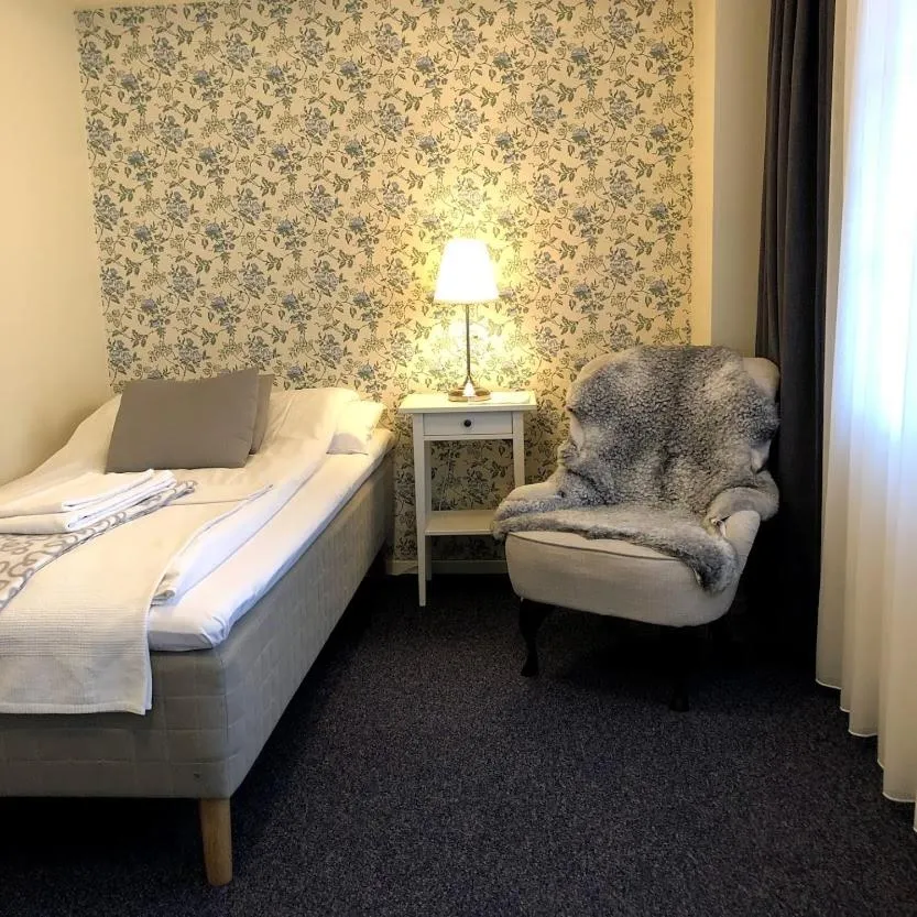 Photo of the whole room, Bed in Ödevata Gårdshotell