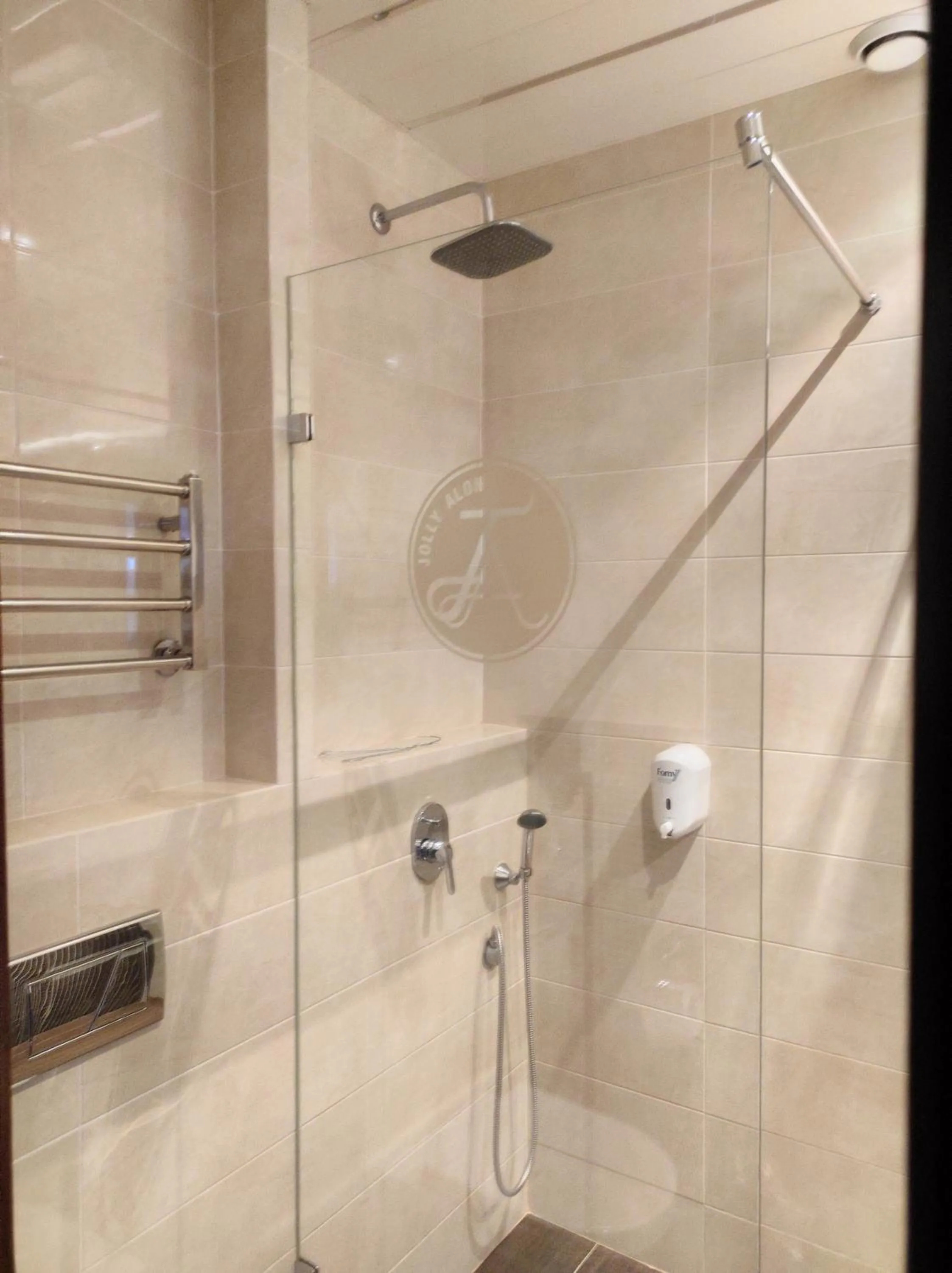 Shower in Jolly Alon Hotel & Business Center