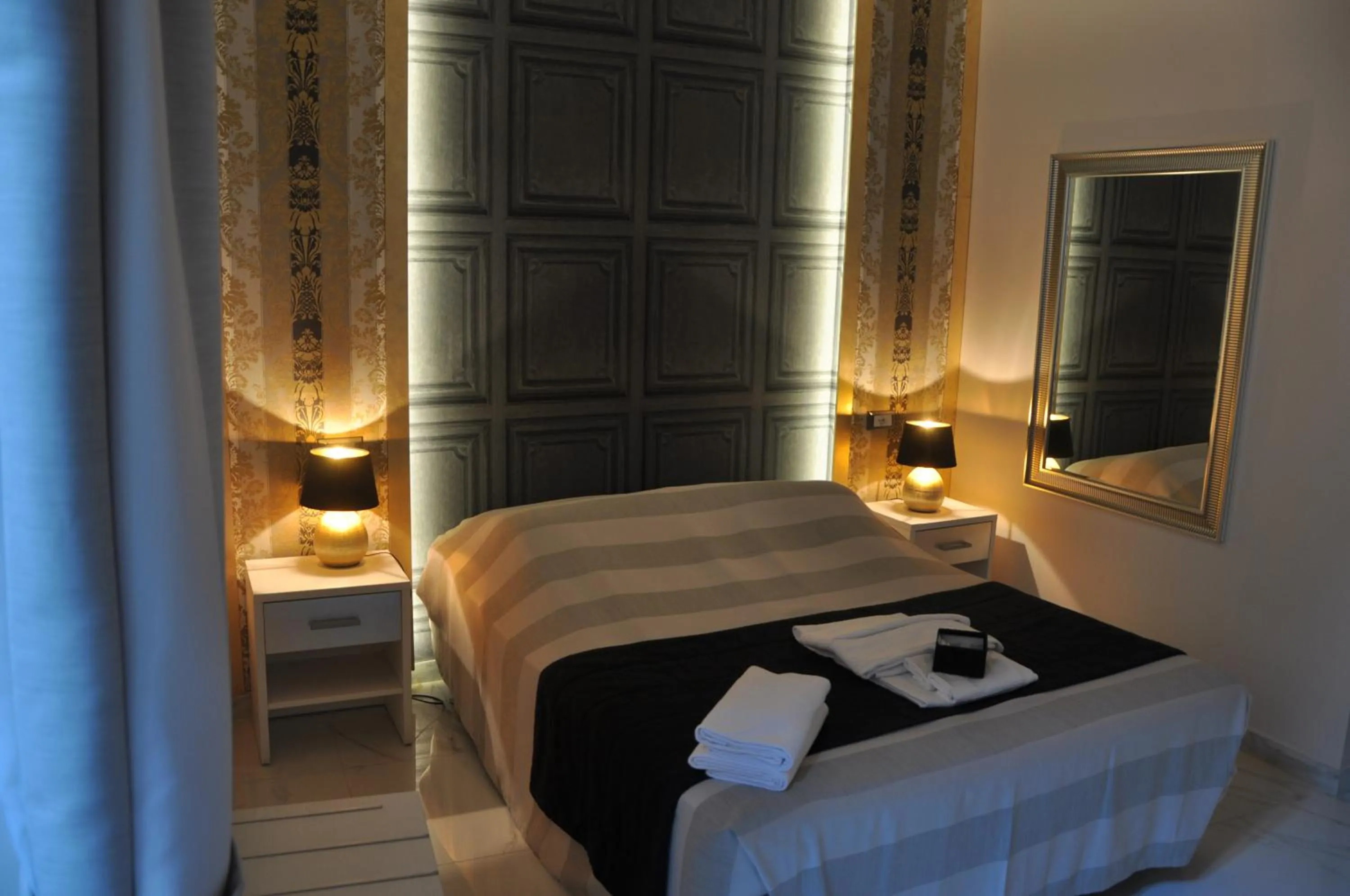 Photo of the whole room, Bed in Navona Nice Room