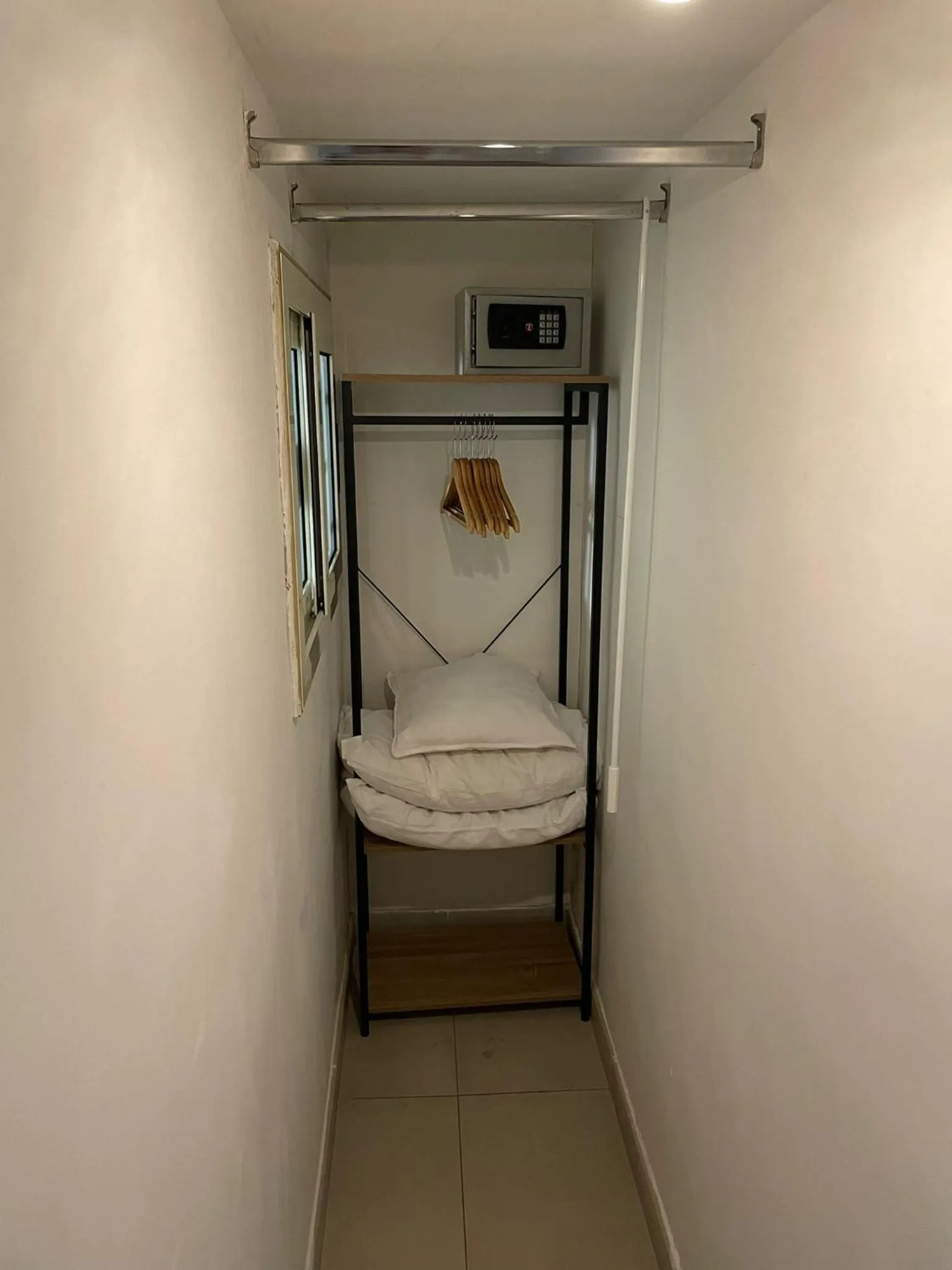 wardrobe, Bed in Terrazza Aragon Room and SPA